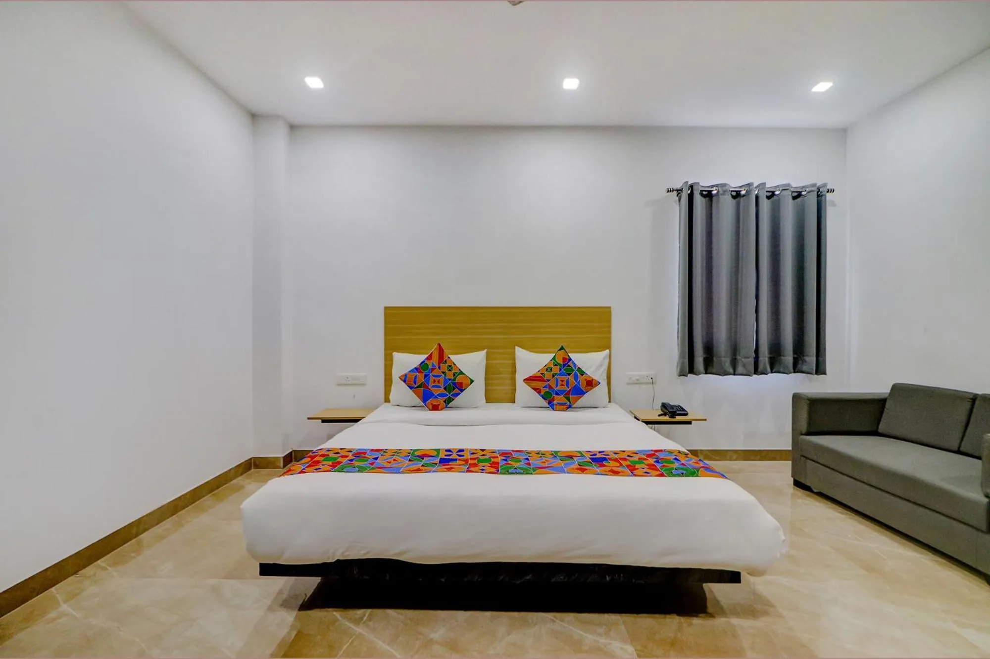 Bed in FabHotel Premium Kashi - Sarnath museum