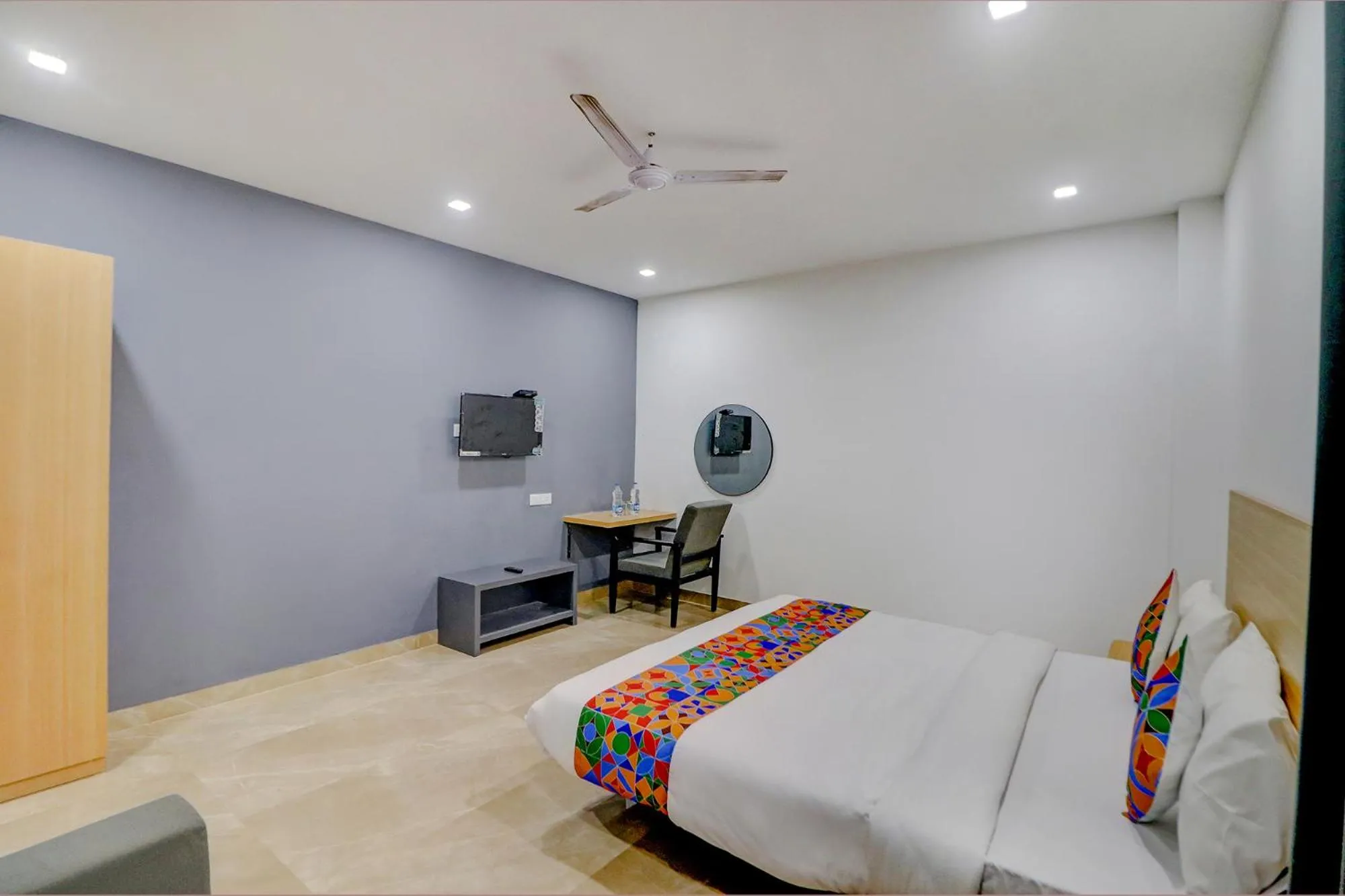 Bed in FabHotel Premium Kashi - Sarnath museum