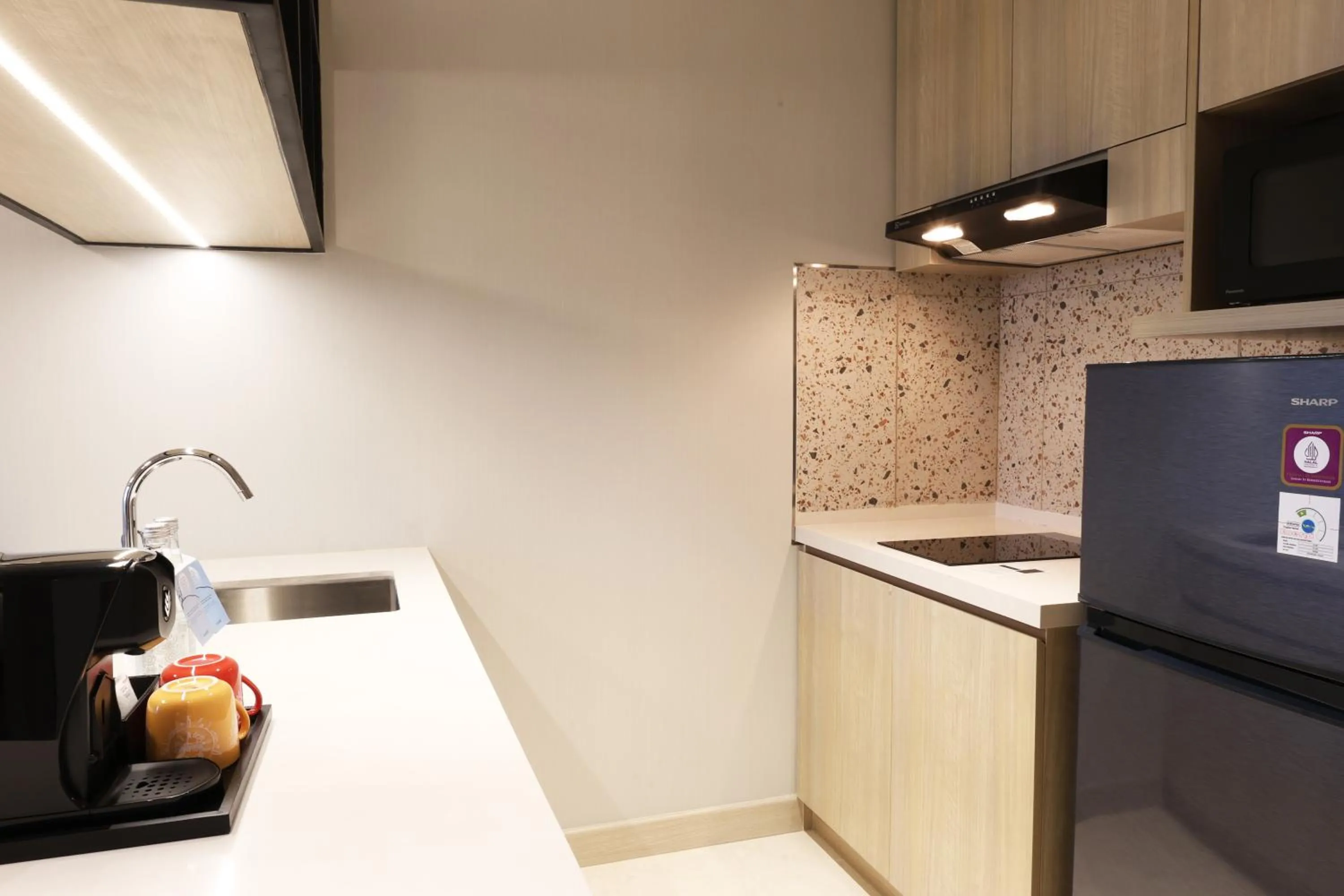 kitchen in Swissôtel Living Jakarta Mega Kuningan