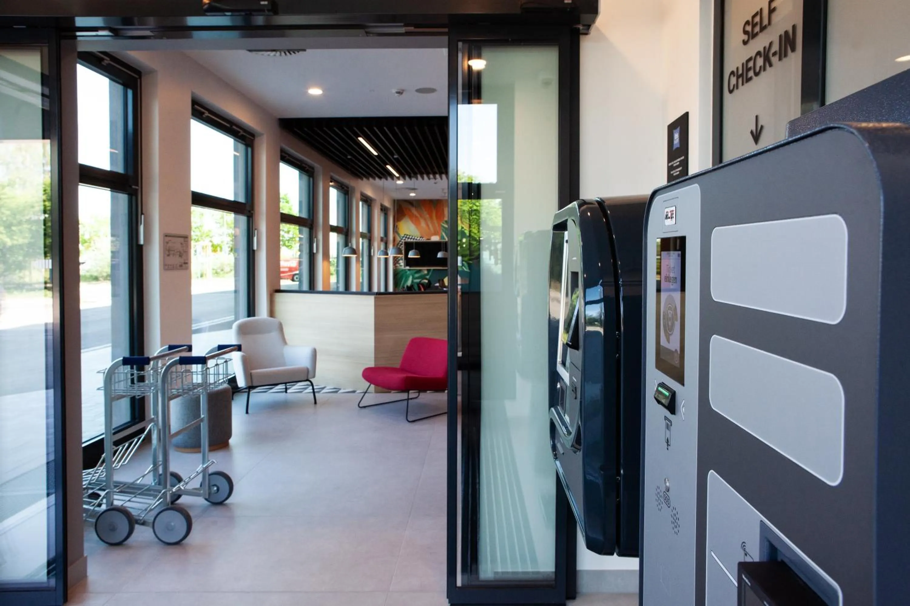 Lobby or reception in ibis budget Hotel Berlin Airport