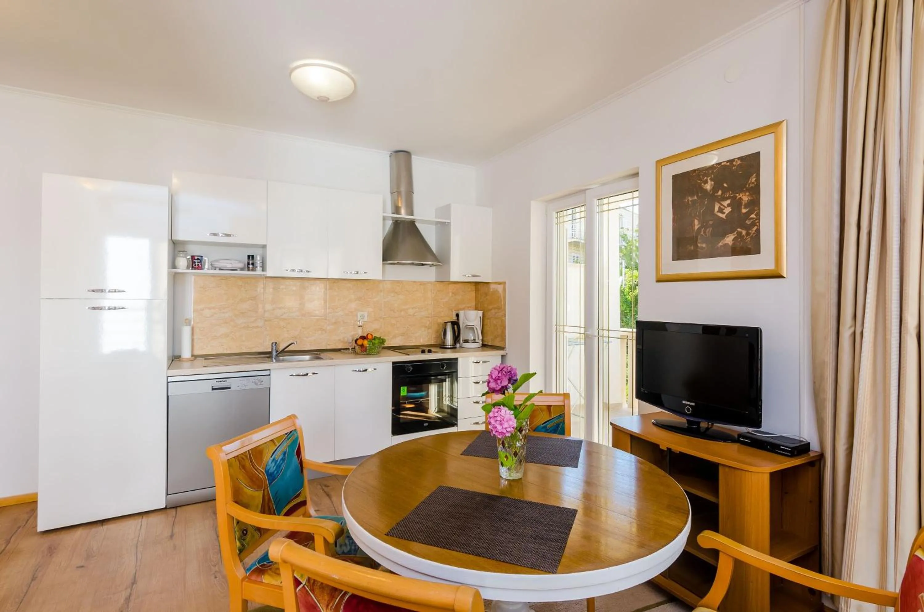 Dining area in Apartments & Rooms V&M