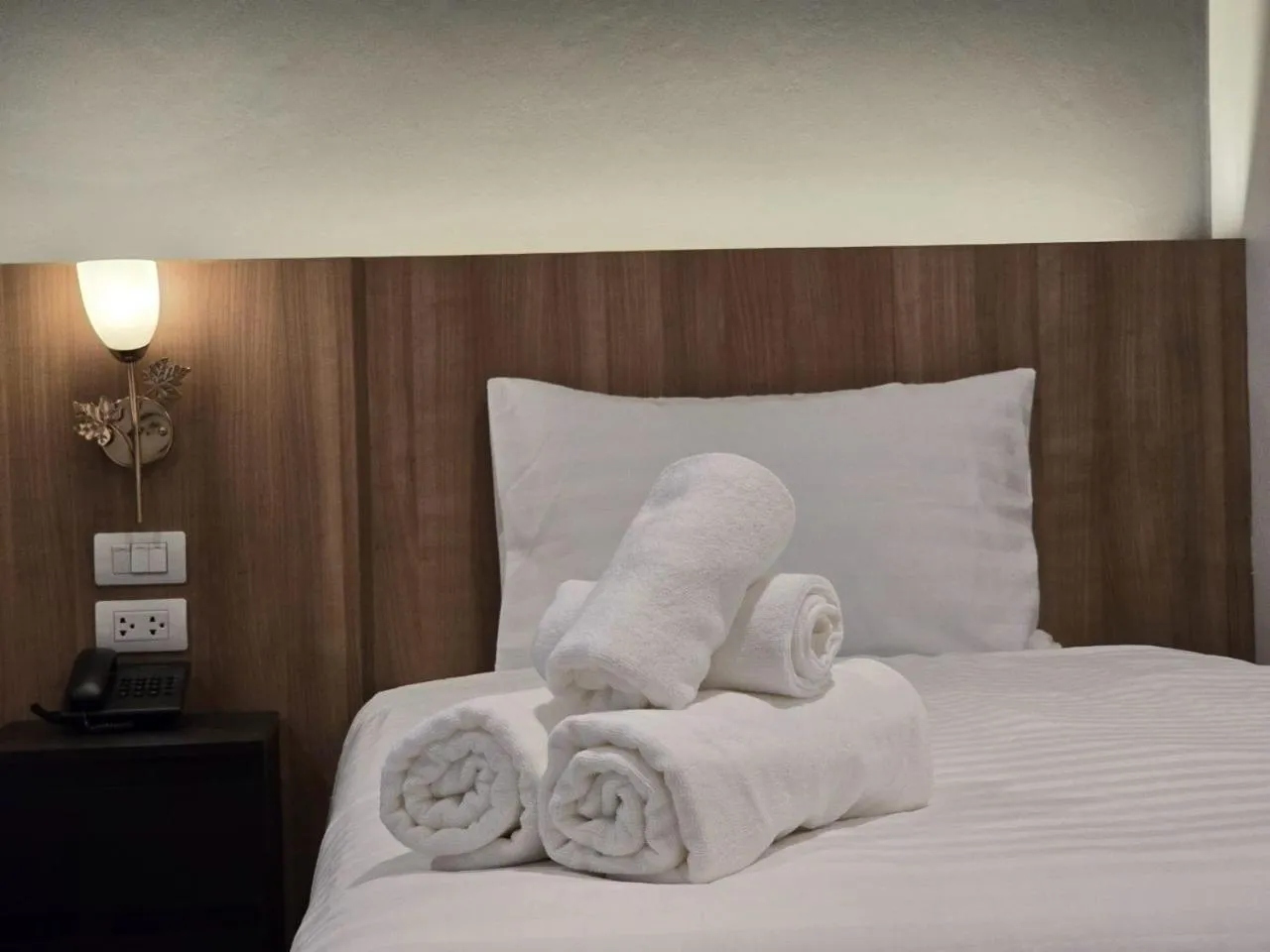 towels, Bed in Manee Mantra Hotel, Kanchanaburi