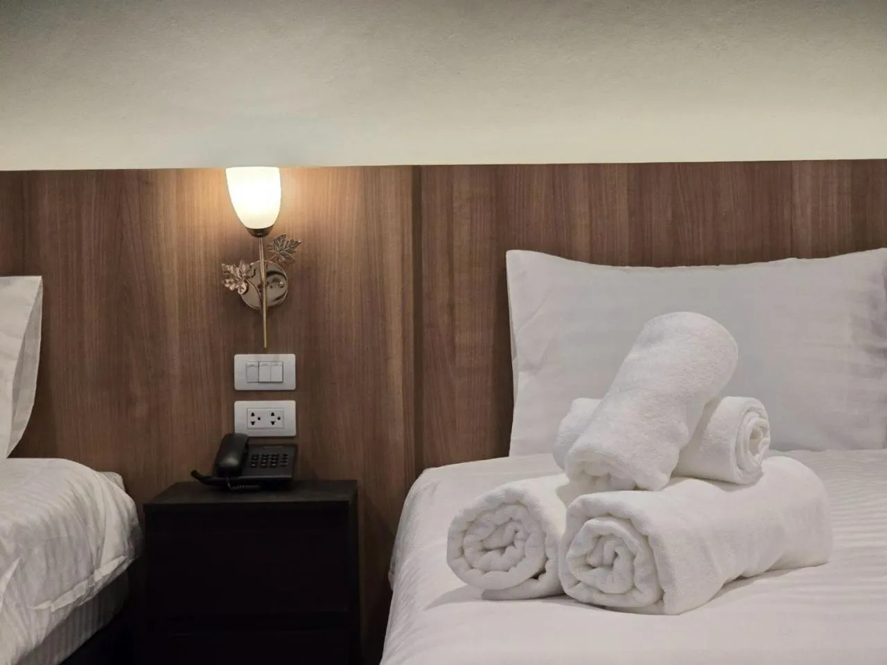 towels, Bed in Manee Mantra Hotel, Kanchanaburi