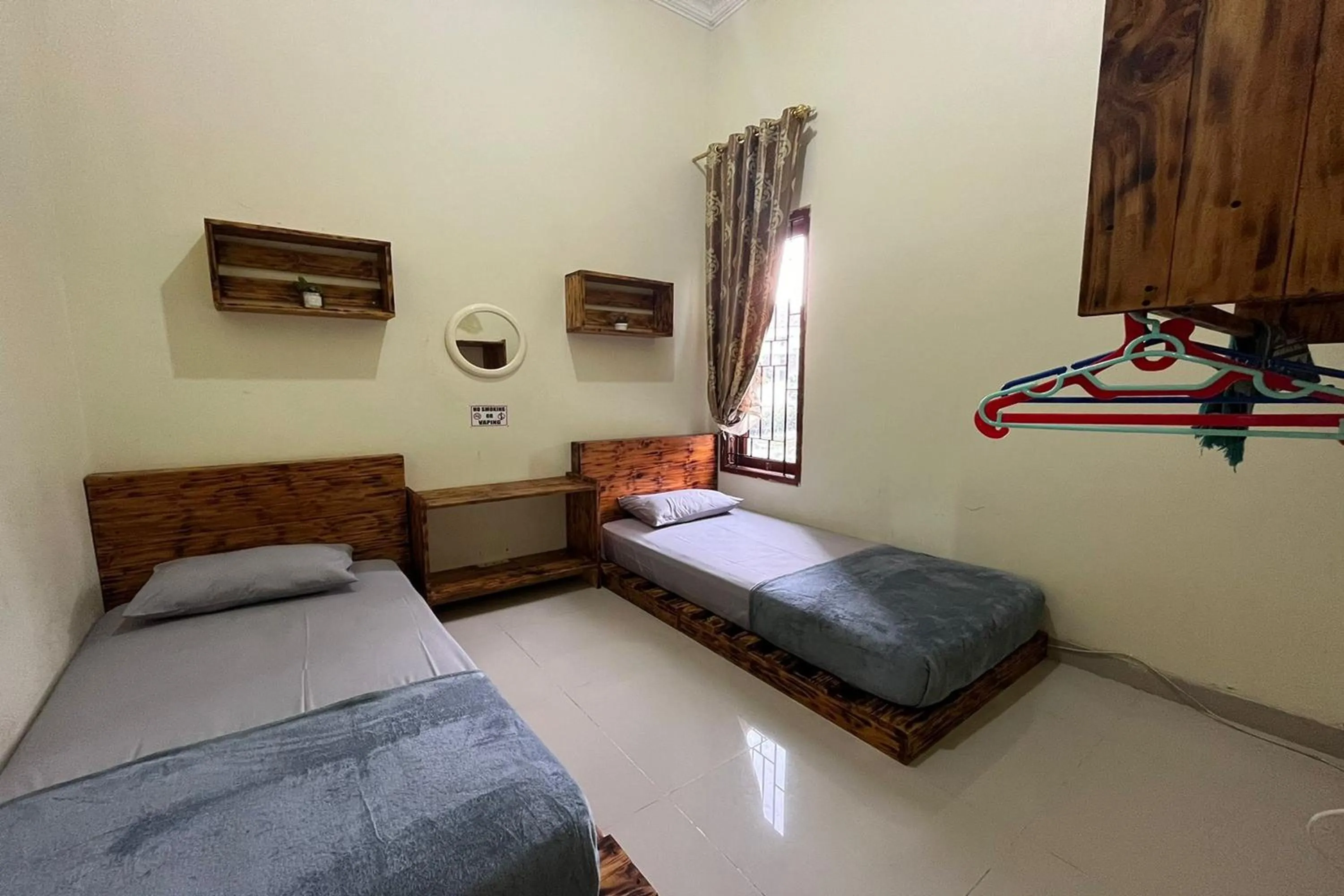 Bedroom, Bed in Jirek Homestay Bukittinggi