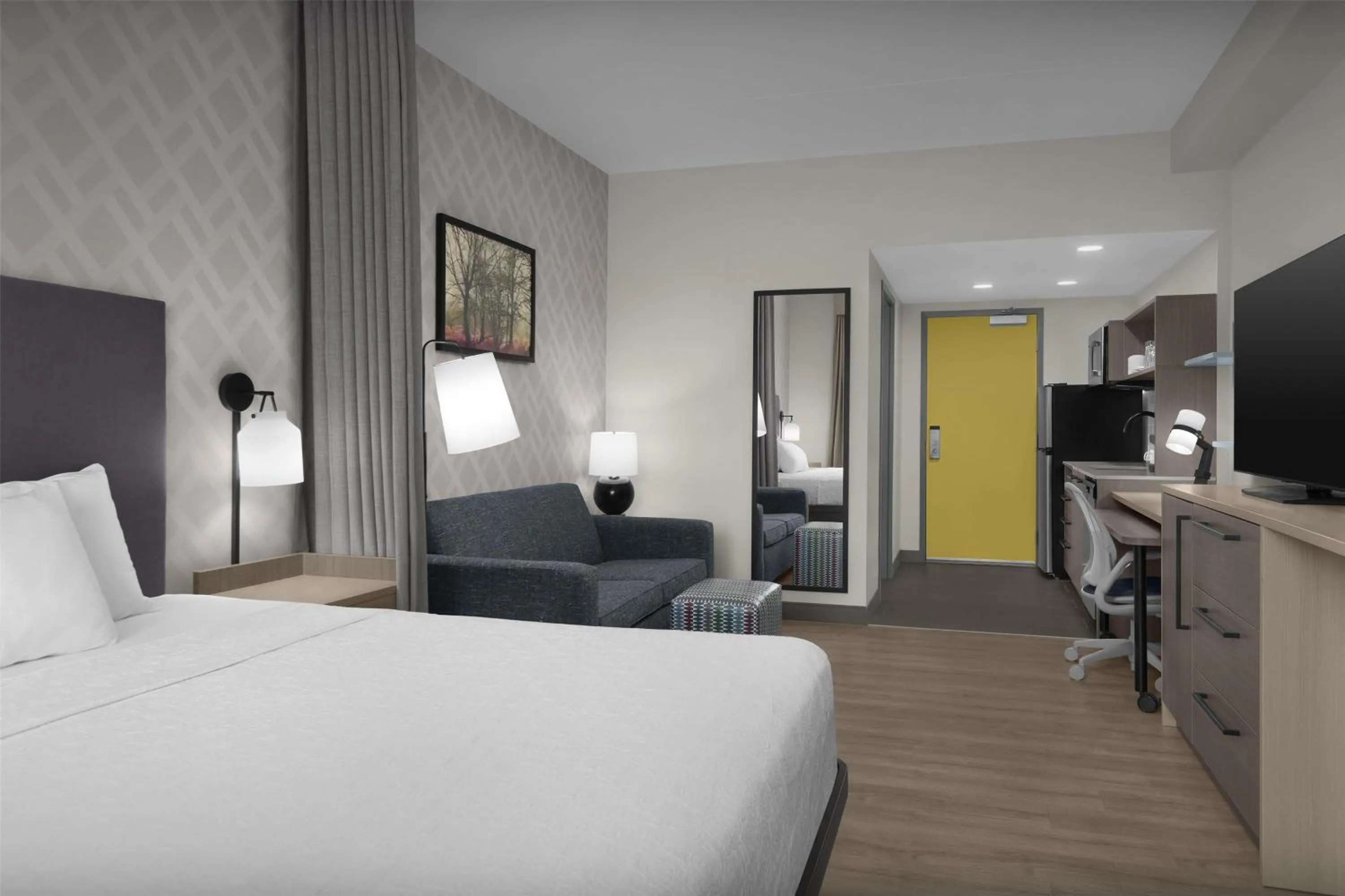 Living room, Bed in Home2 Suites By Hilton Sevierville