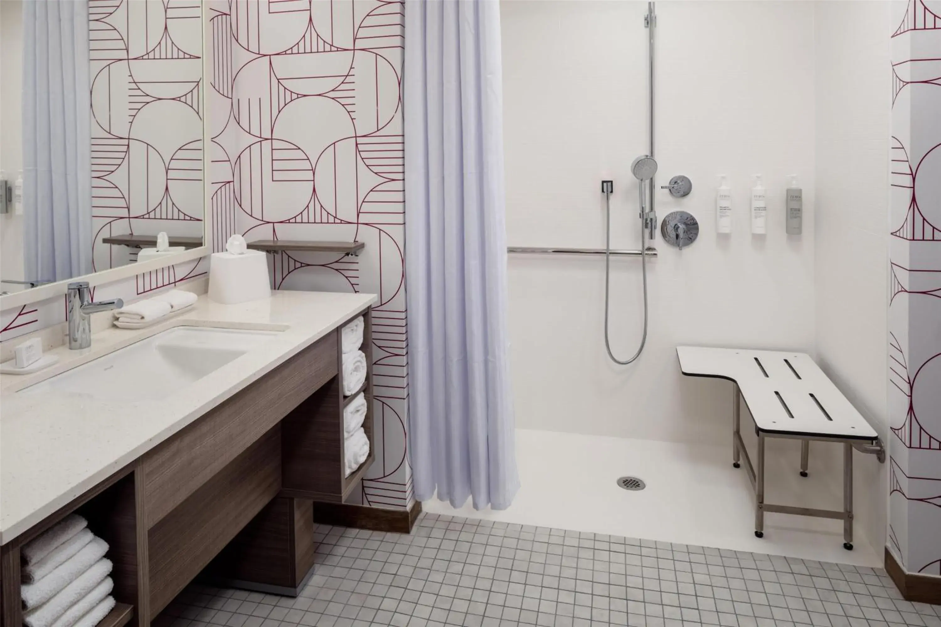 Bathroom in Home2 Suites By Hilton Clearwater St. Petersburg Ulmerton Rd Bathroom in Home2 Suites By Hilton Clearwater St. Petersburg Ulmerton Rd