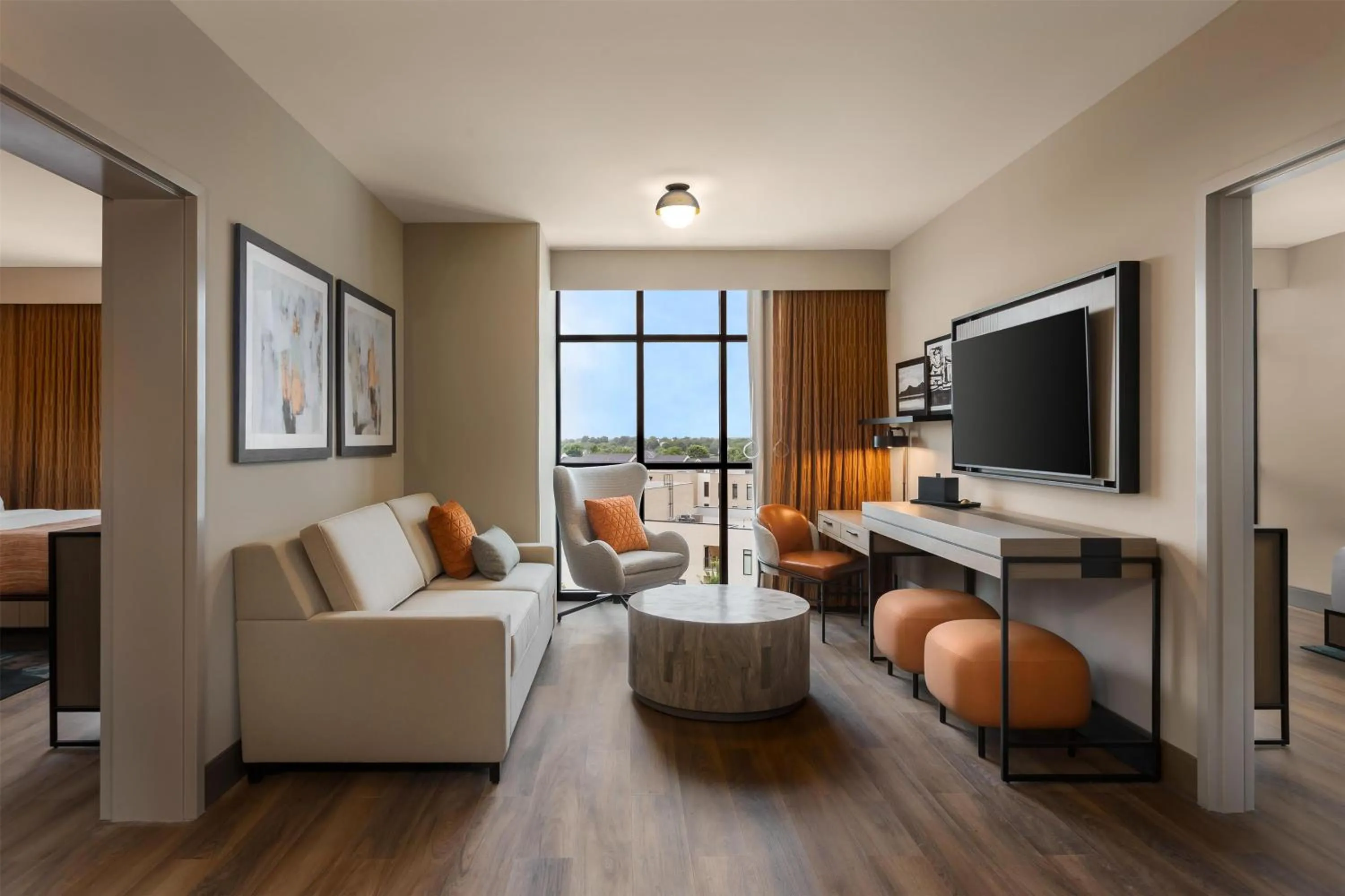 Living room in Hotel Avail Rogers, Tapestry Collection By Hilton