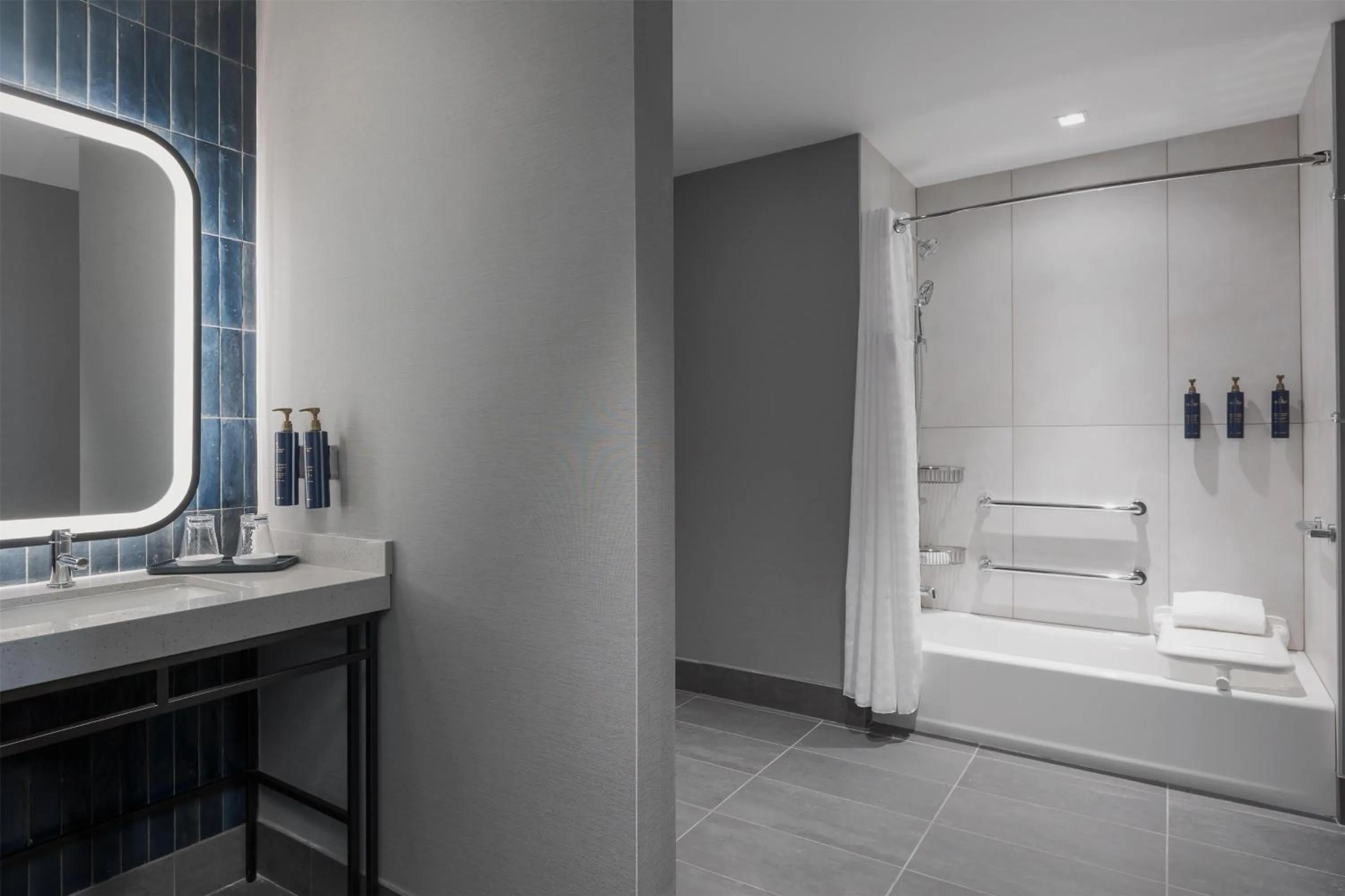 Bathroom in Hotel Avail Rogers, Tapestry Collection By Hilton