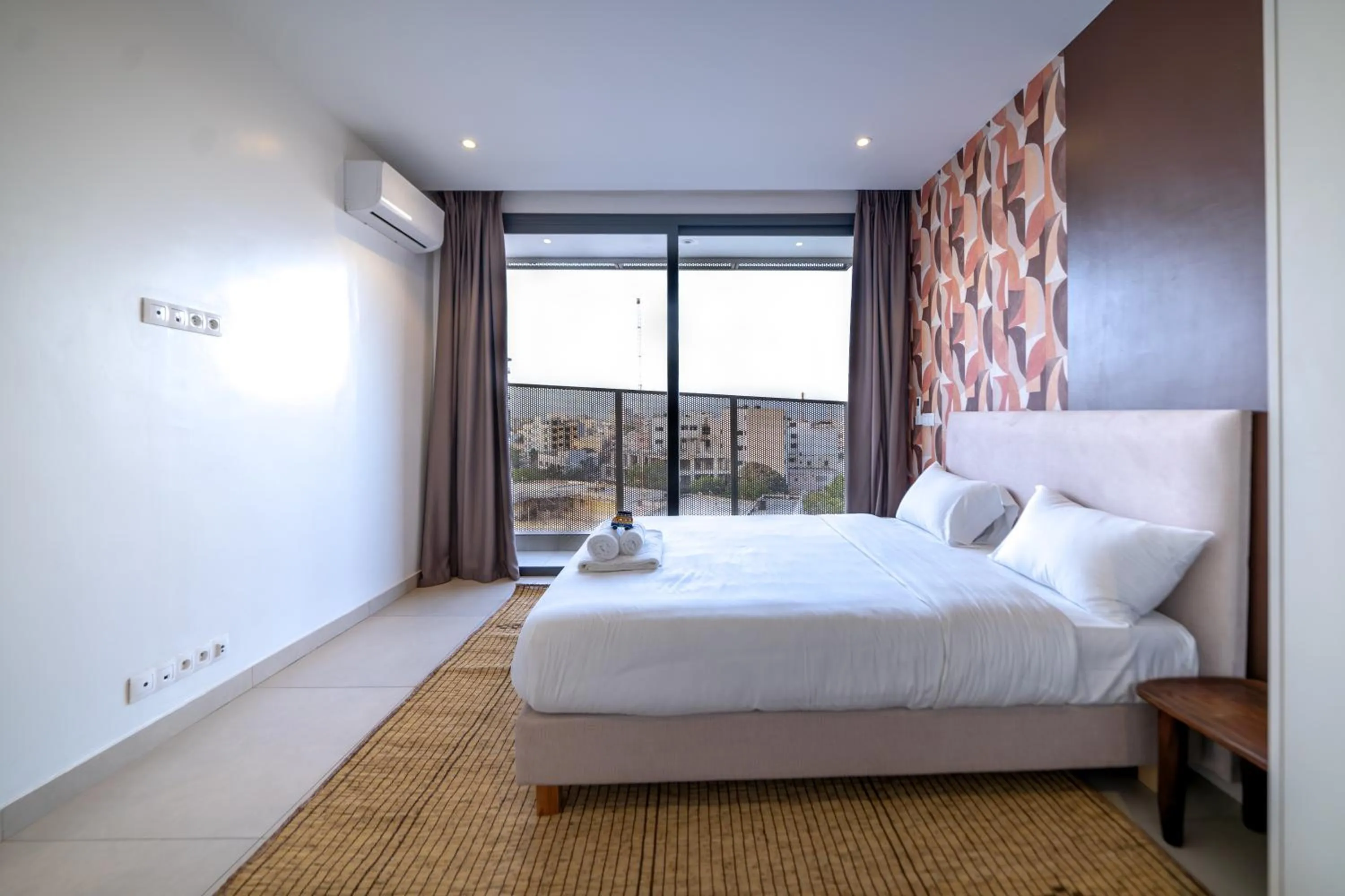 Bedroom, Bed in AfricaWorks Suites