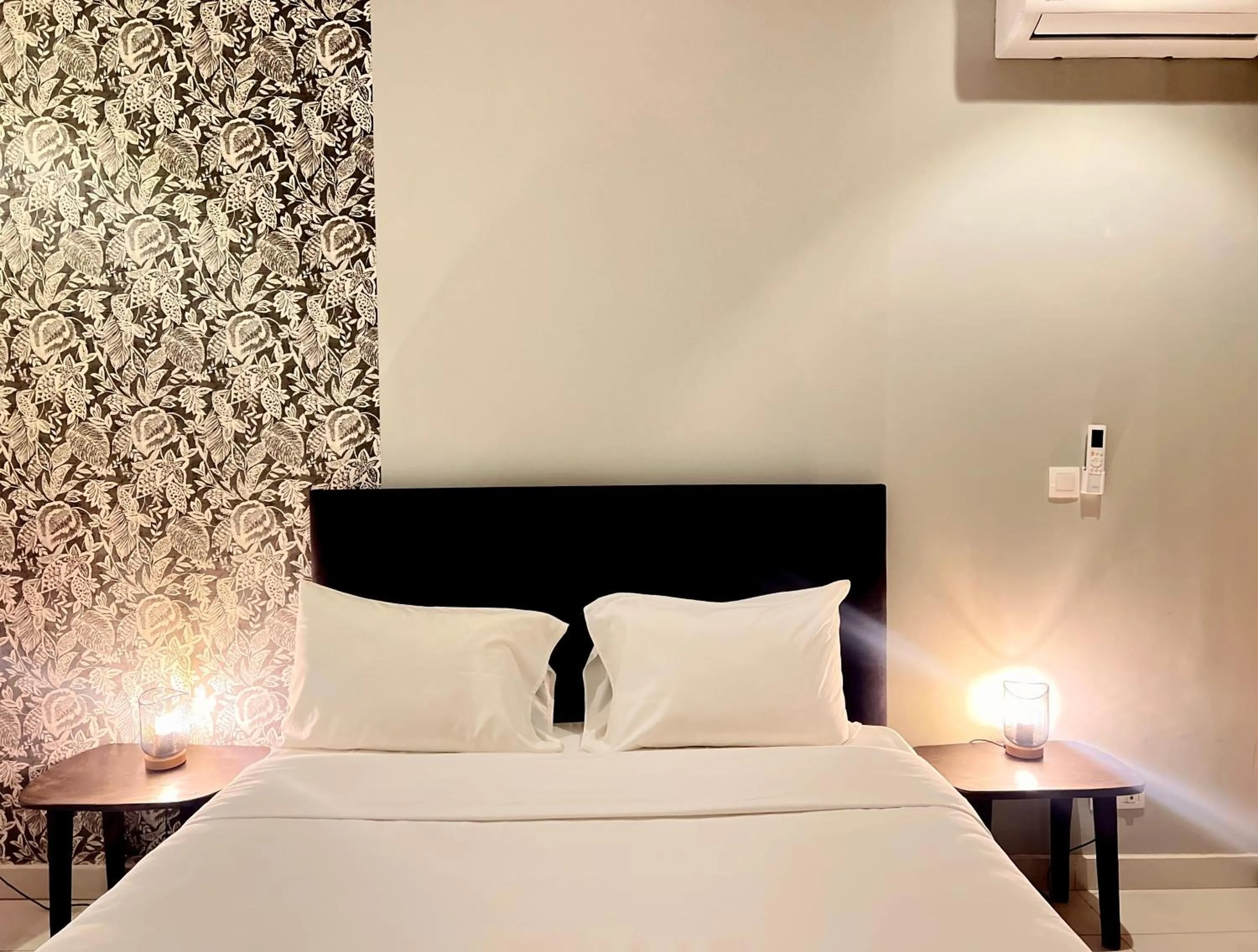 Bed in AfricaWorks Suites