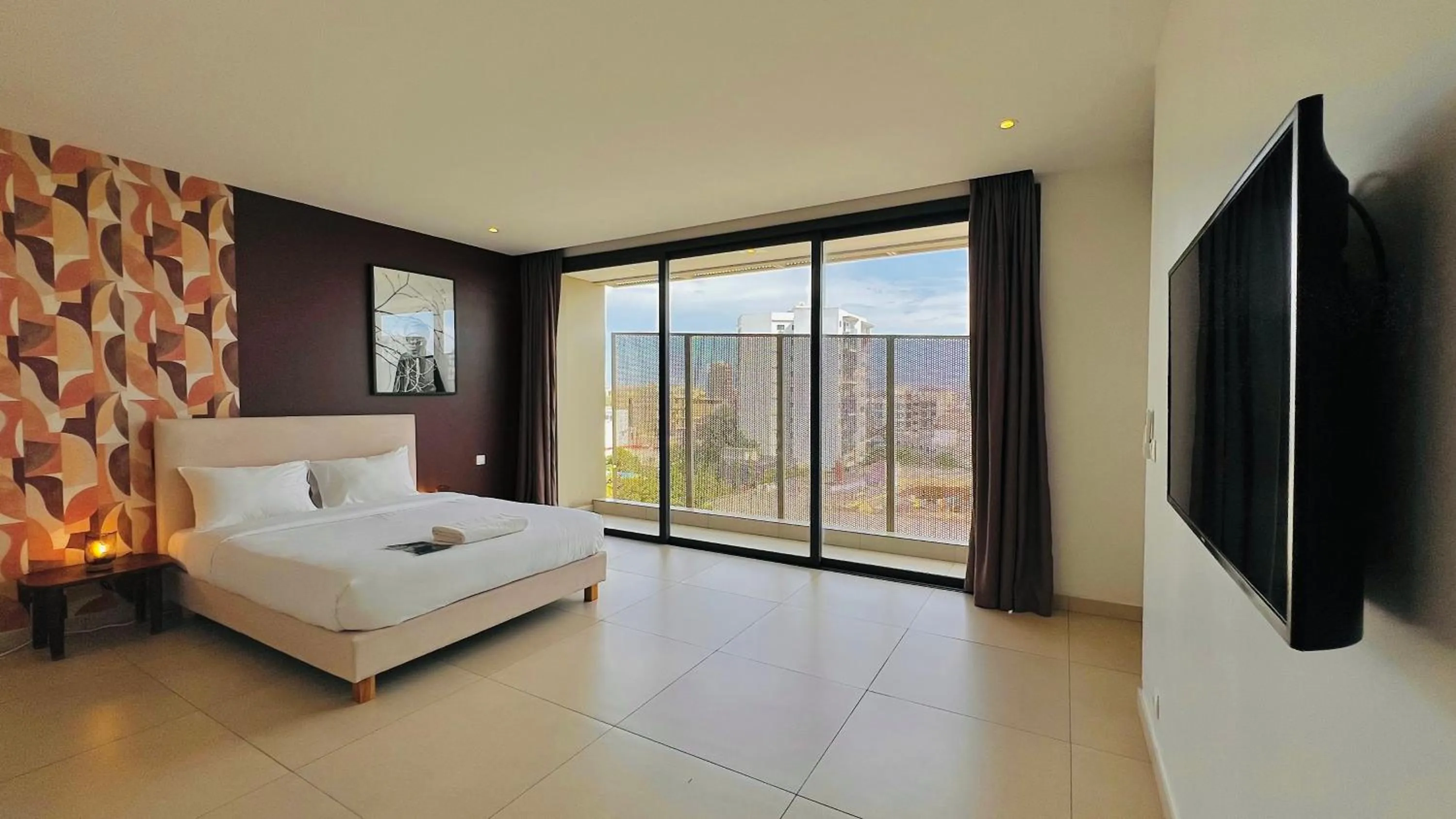 Bed in AfricaWorks Suites