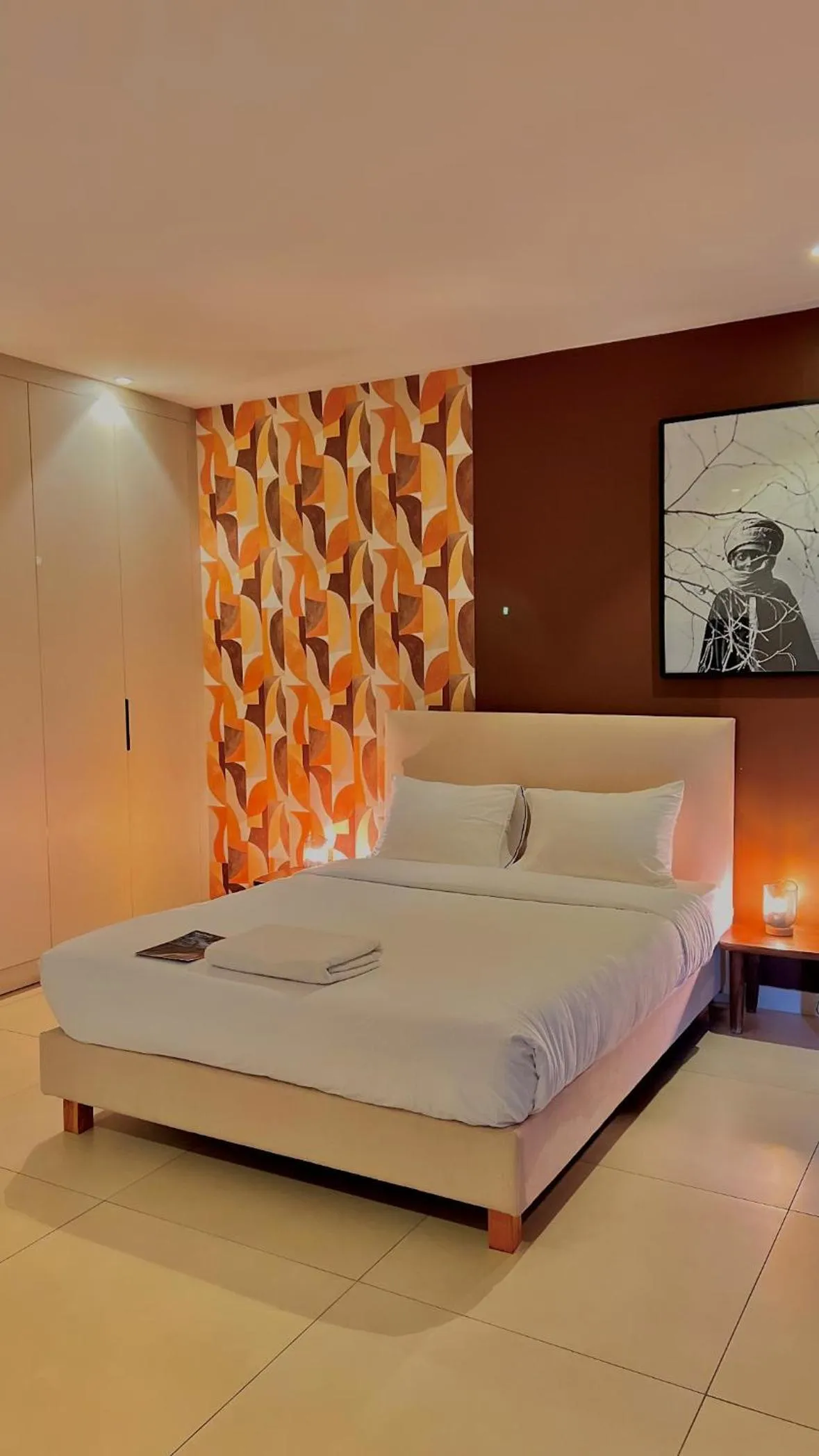 Bed in AfricaWorks Suites