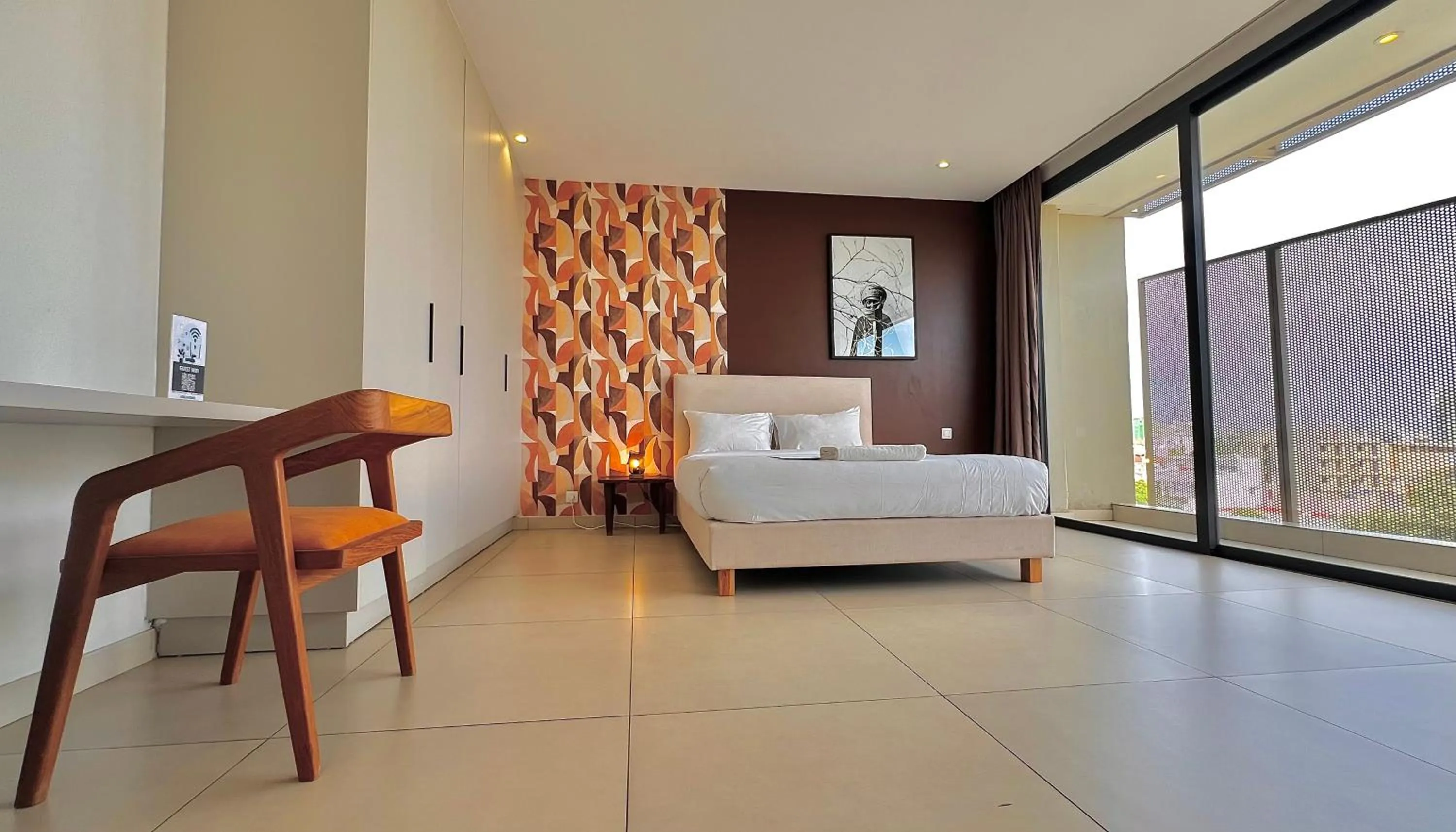 Bed in AfricaWorks Suites