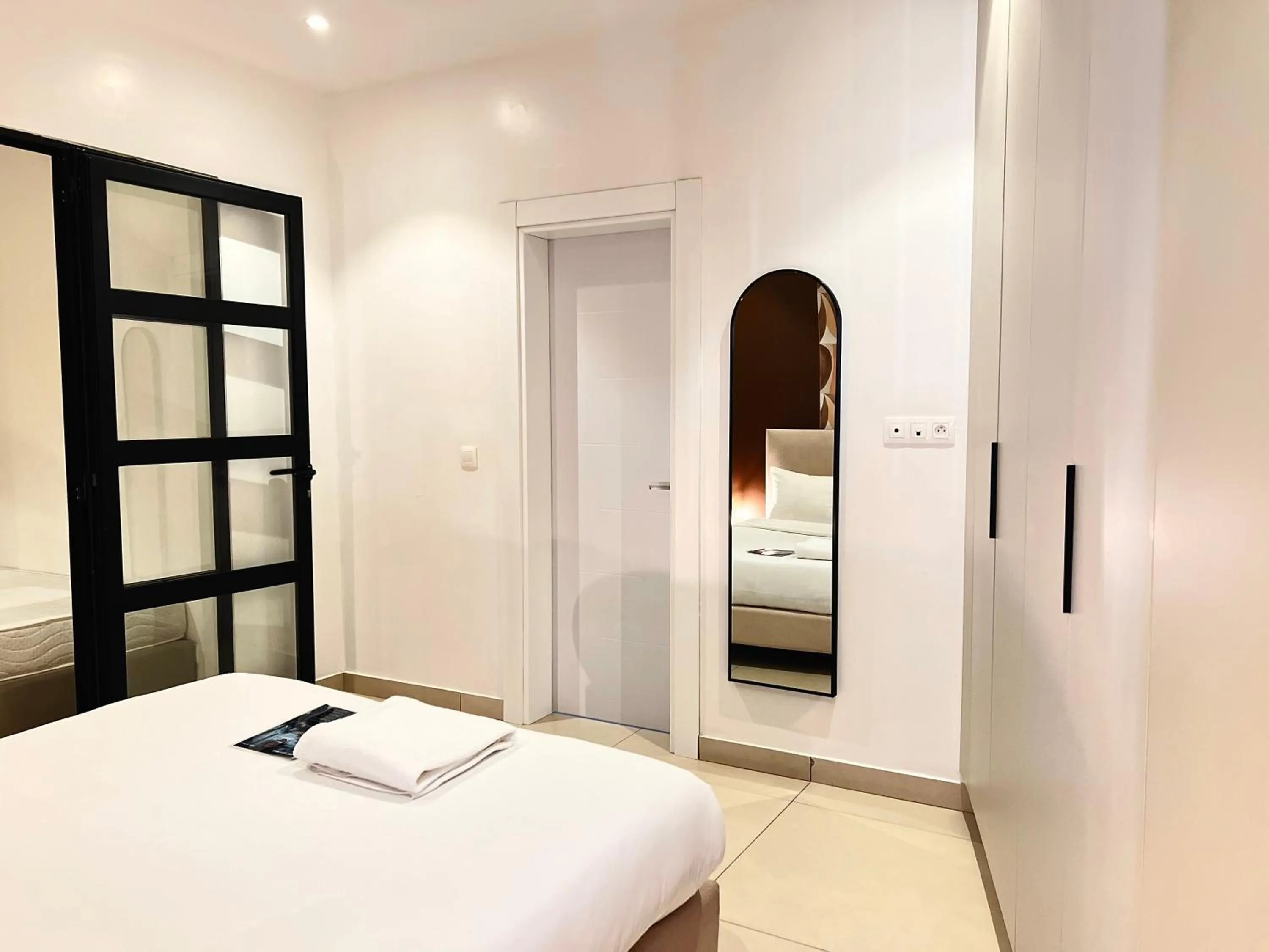 Bed in AfricaWorks Suites