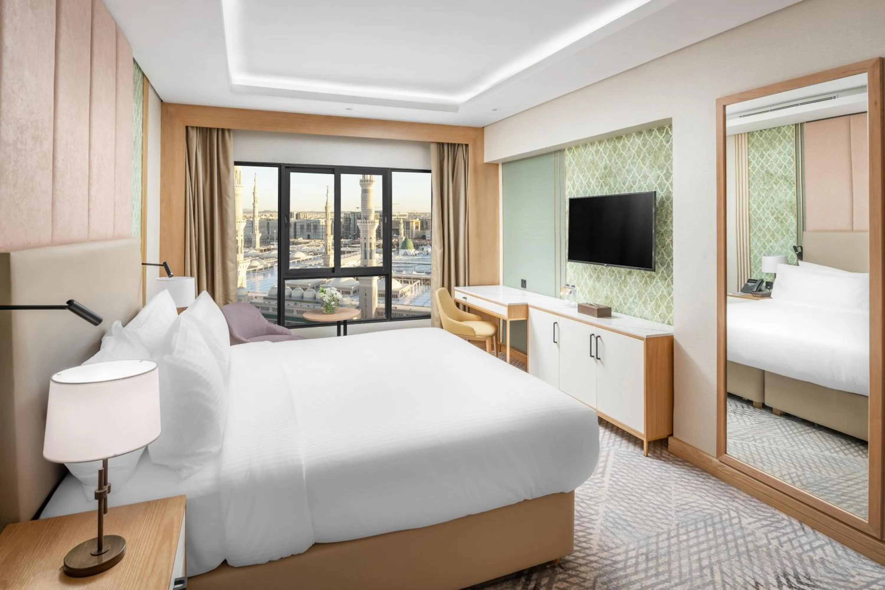 Bed in Makarem Haram view suites