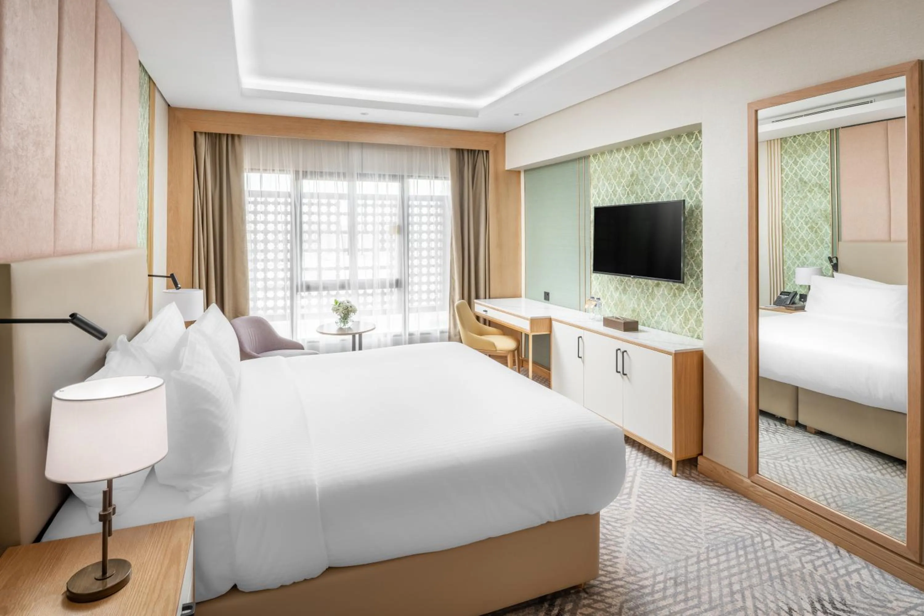 Bed in Makarem Haram view suites