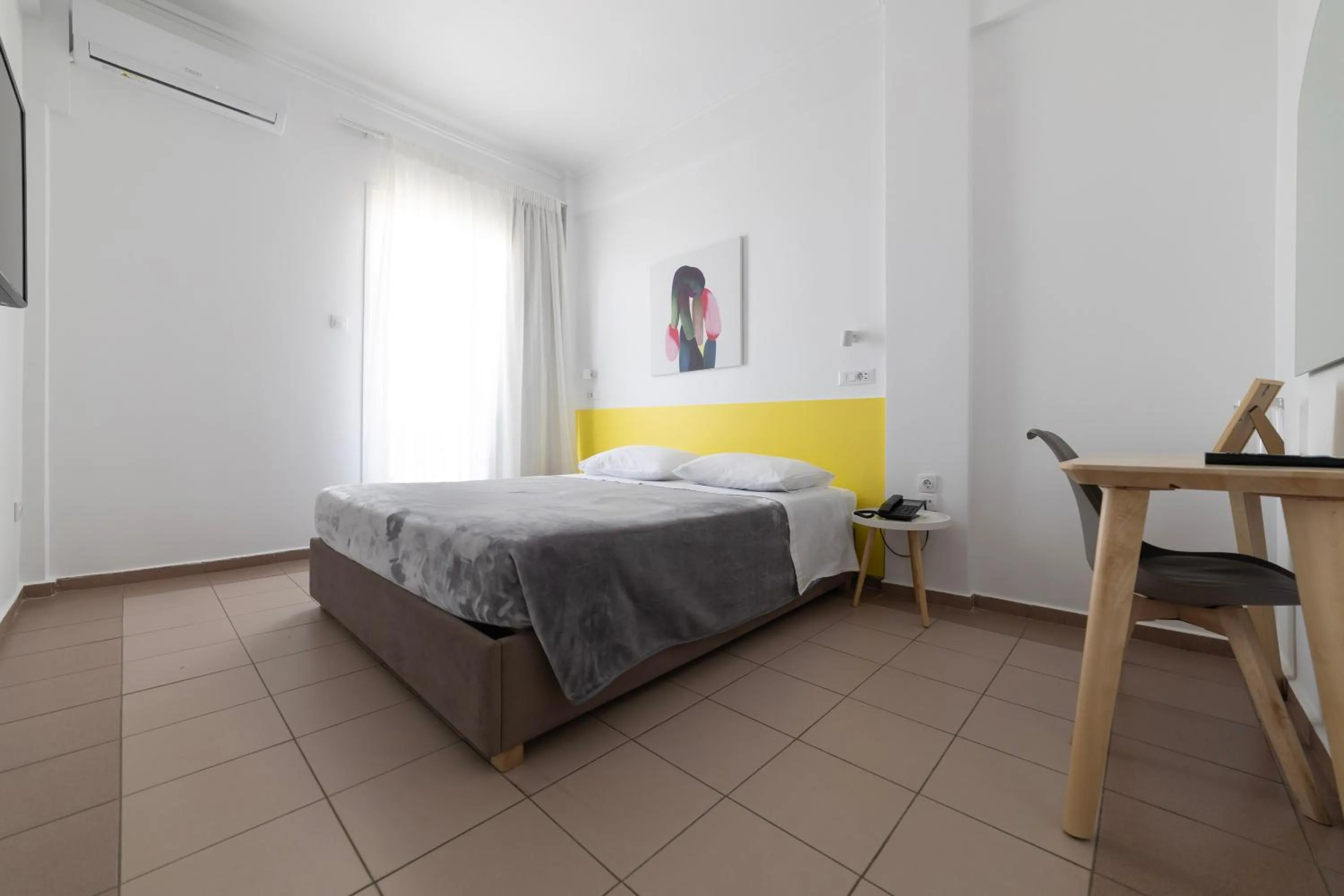 Bed in Delfini Hotel