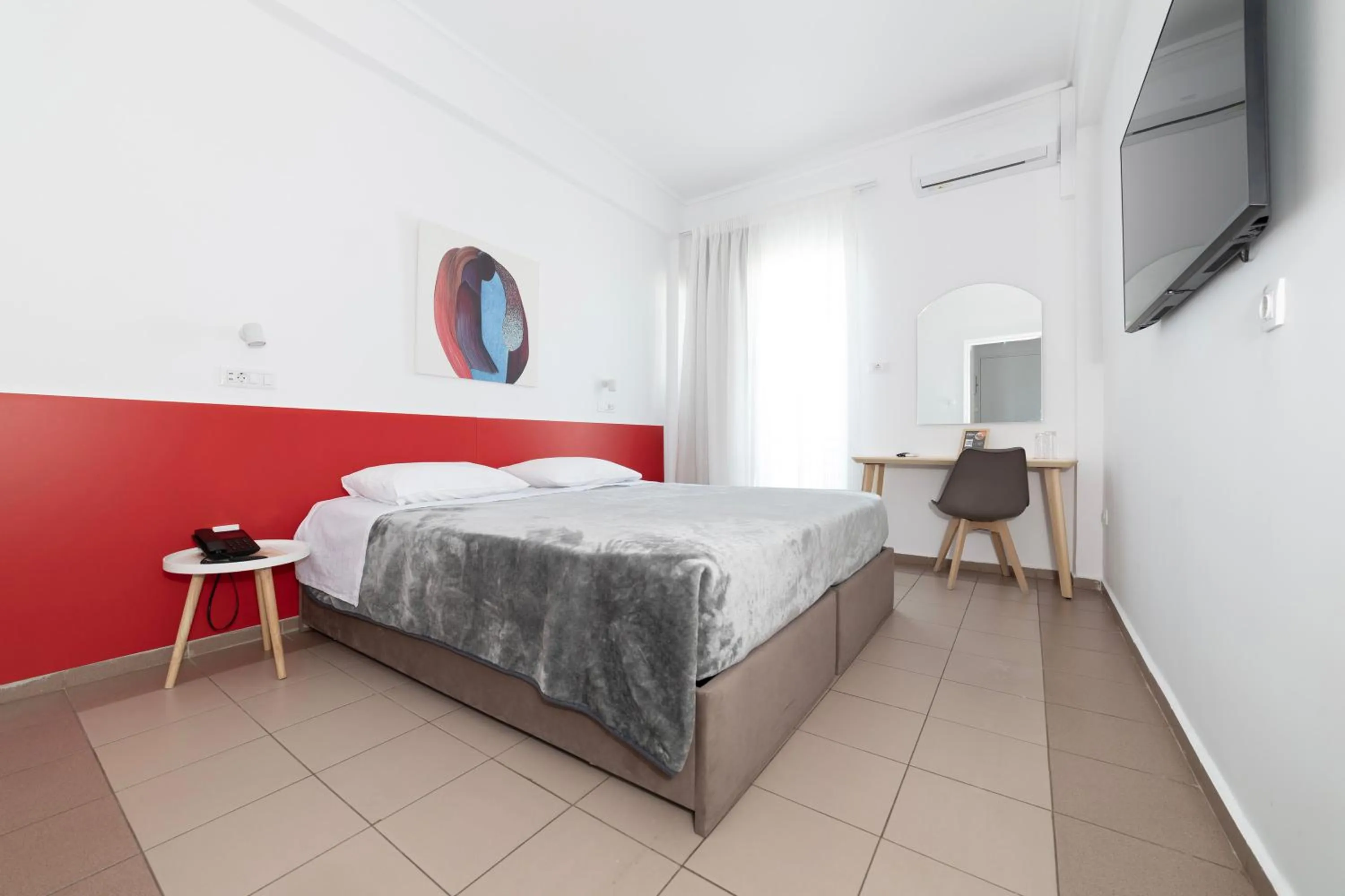 Bed in Delfini Hotel