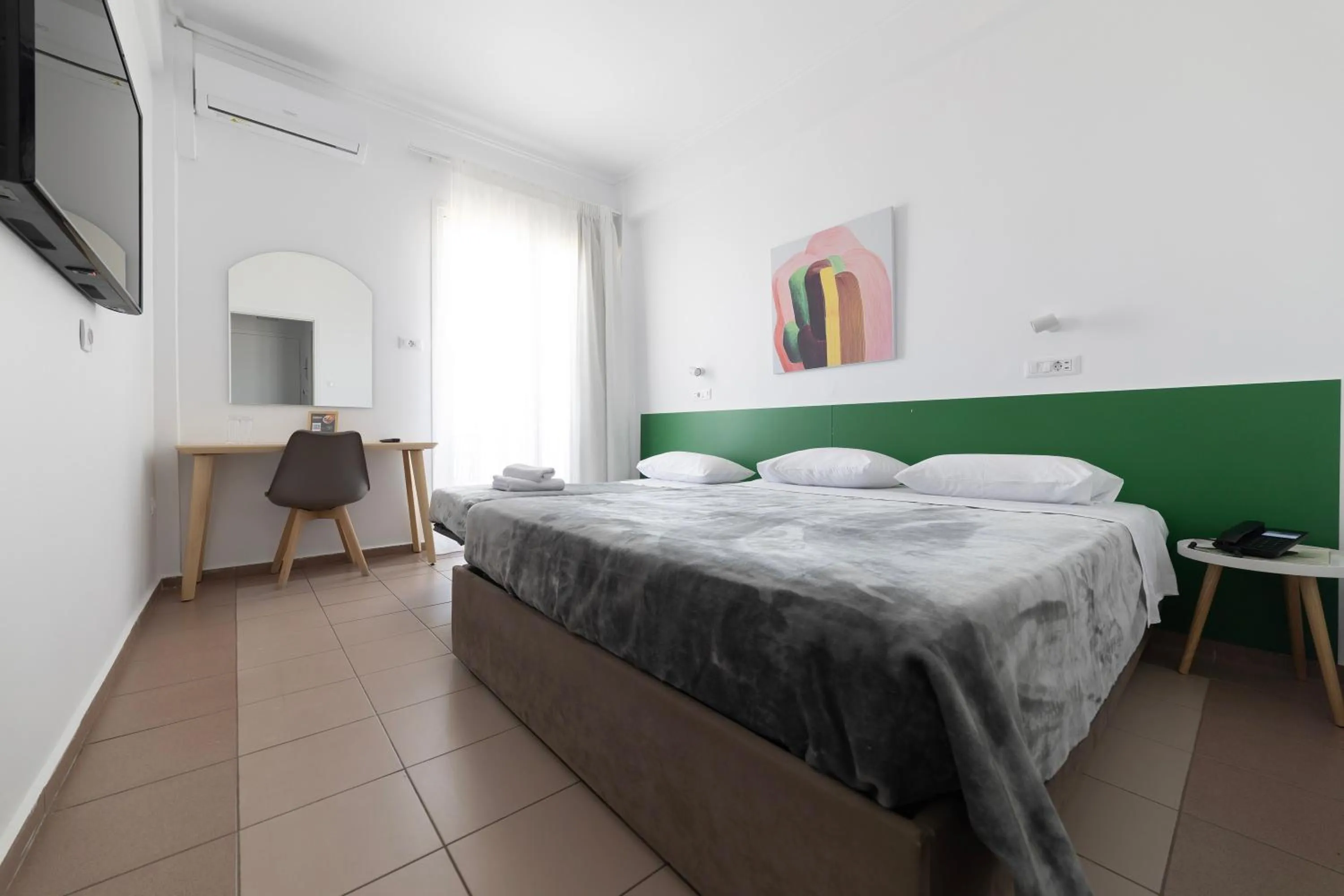 Bed in Delfini Hotel