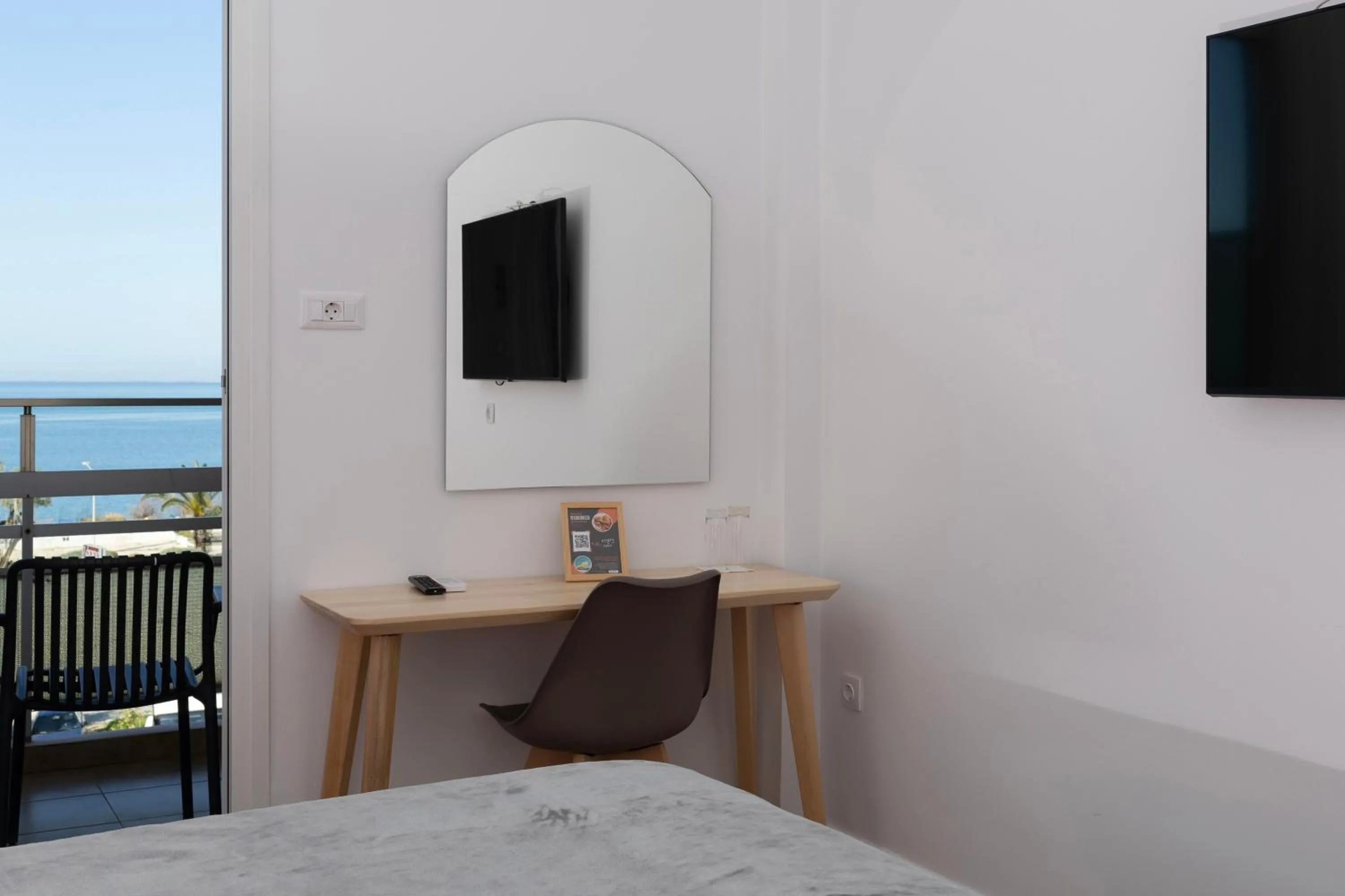 Bedroom in Delfini Hotel