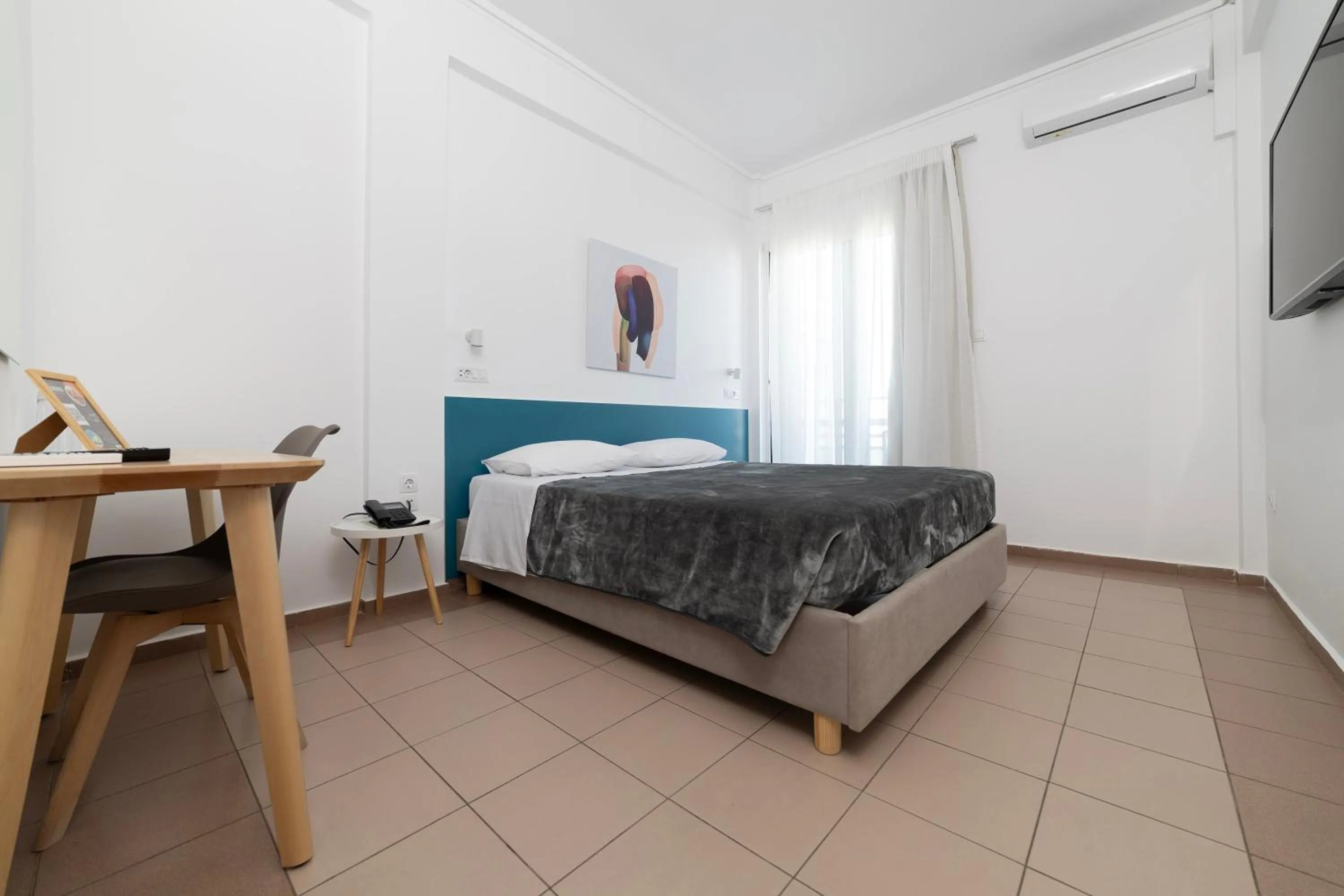 Bed in Delfini Hotel