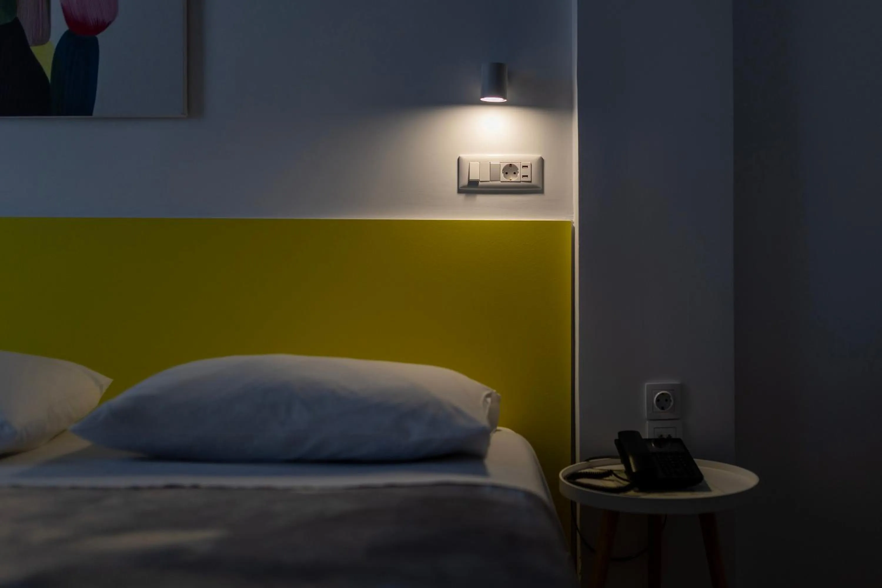 Bed in Delfini Hotel