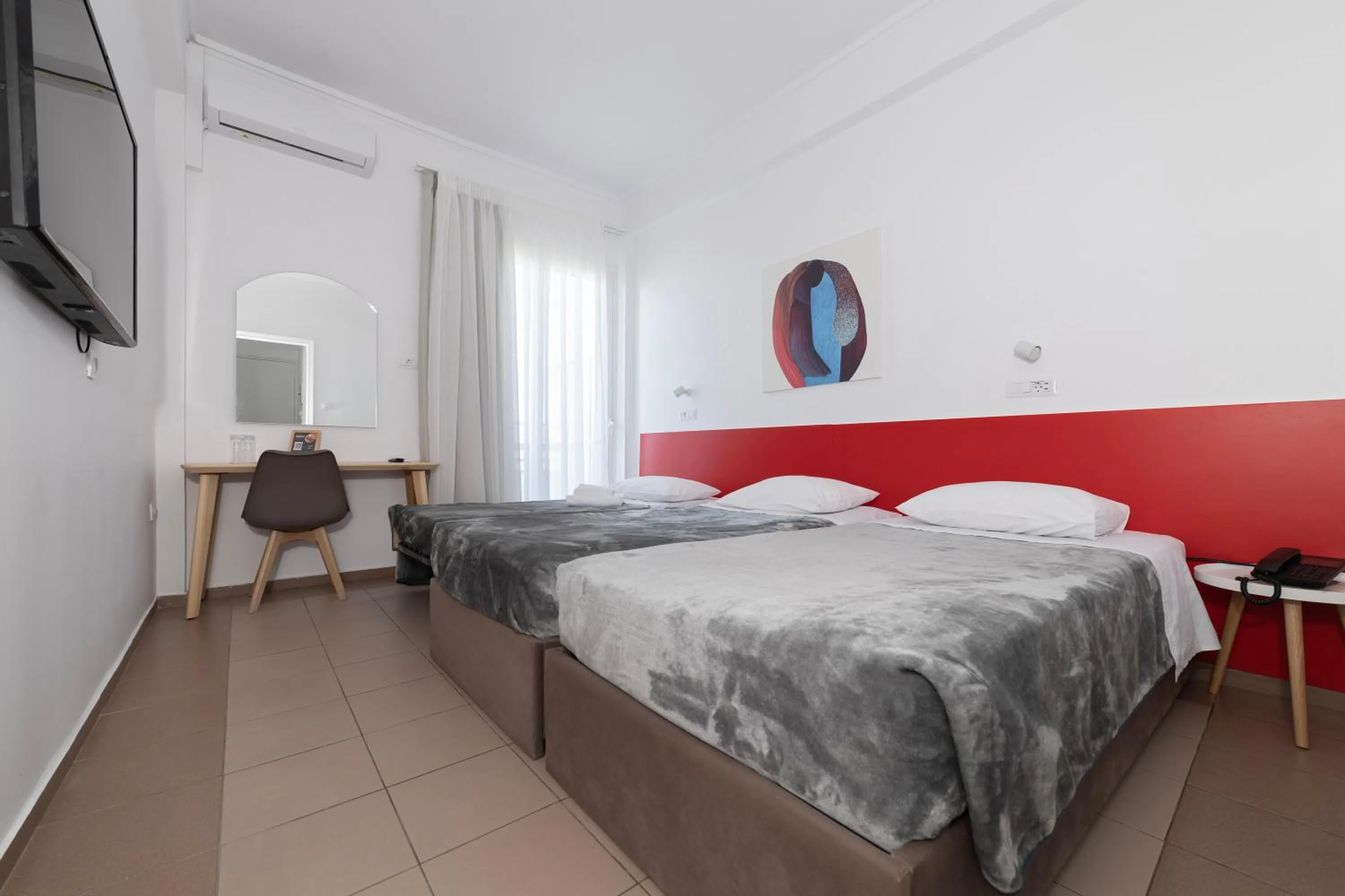 Bed in Delfini Hotel