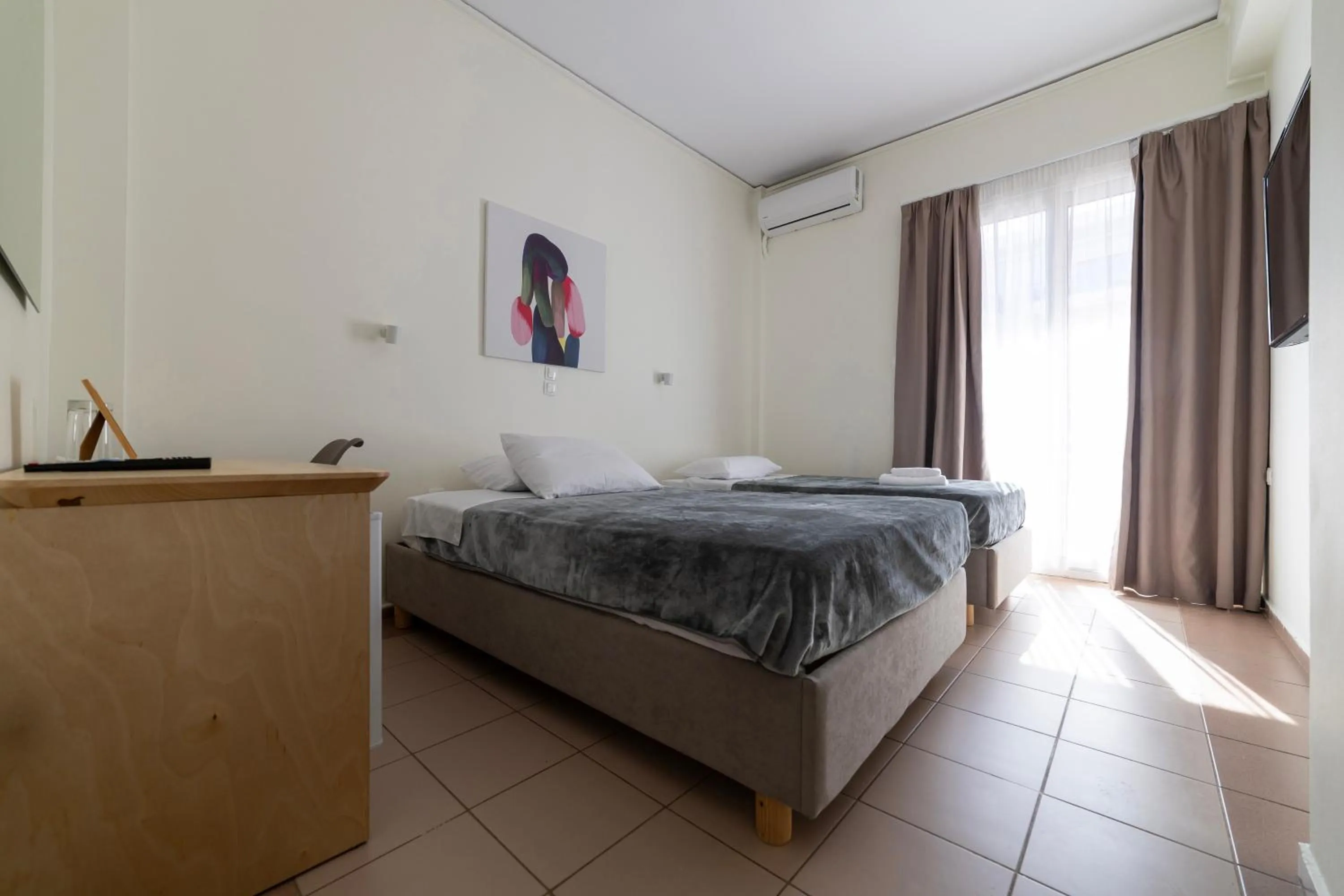 Bed in Delfini Hotel