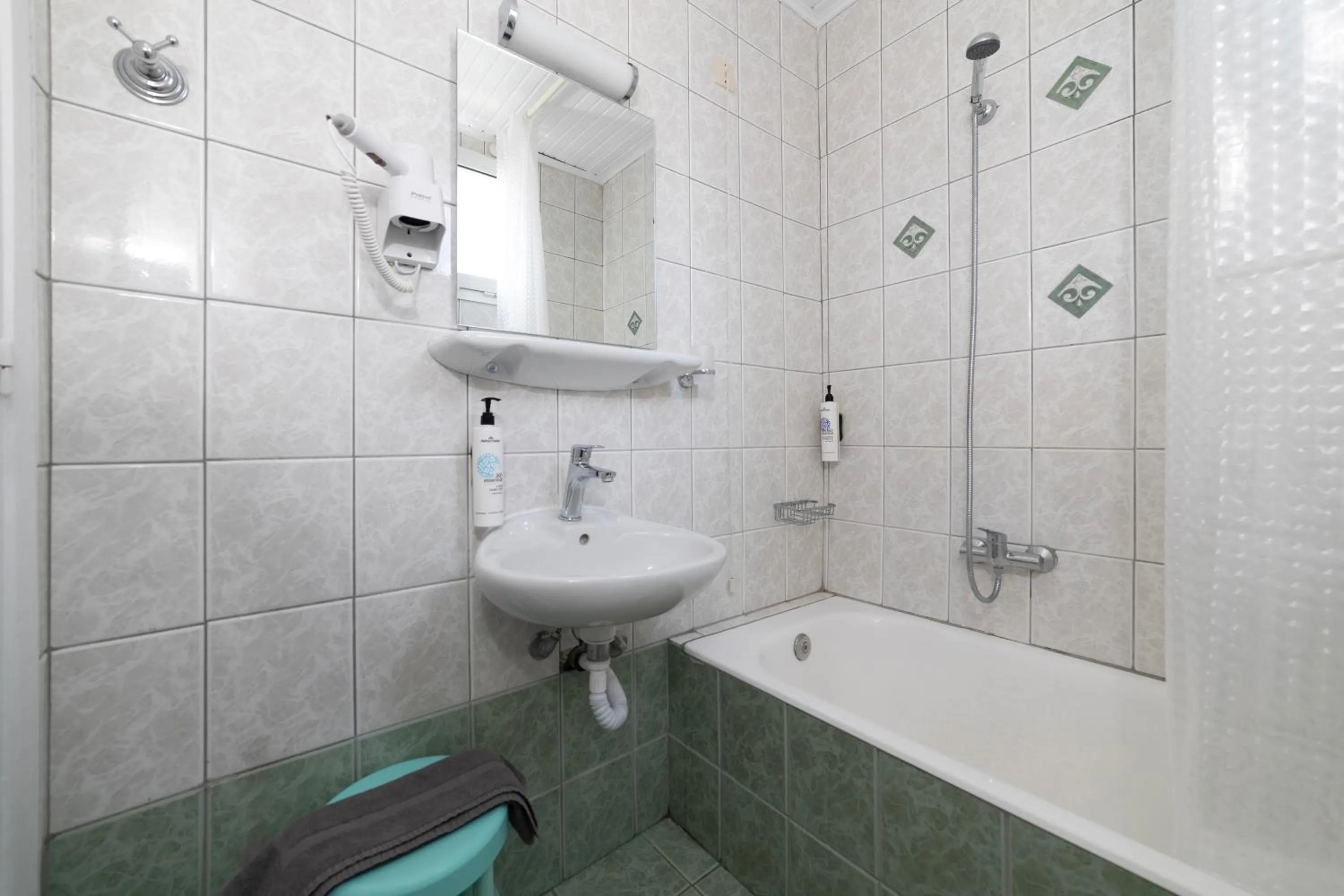 Bathroom in Delfini Hotel