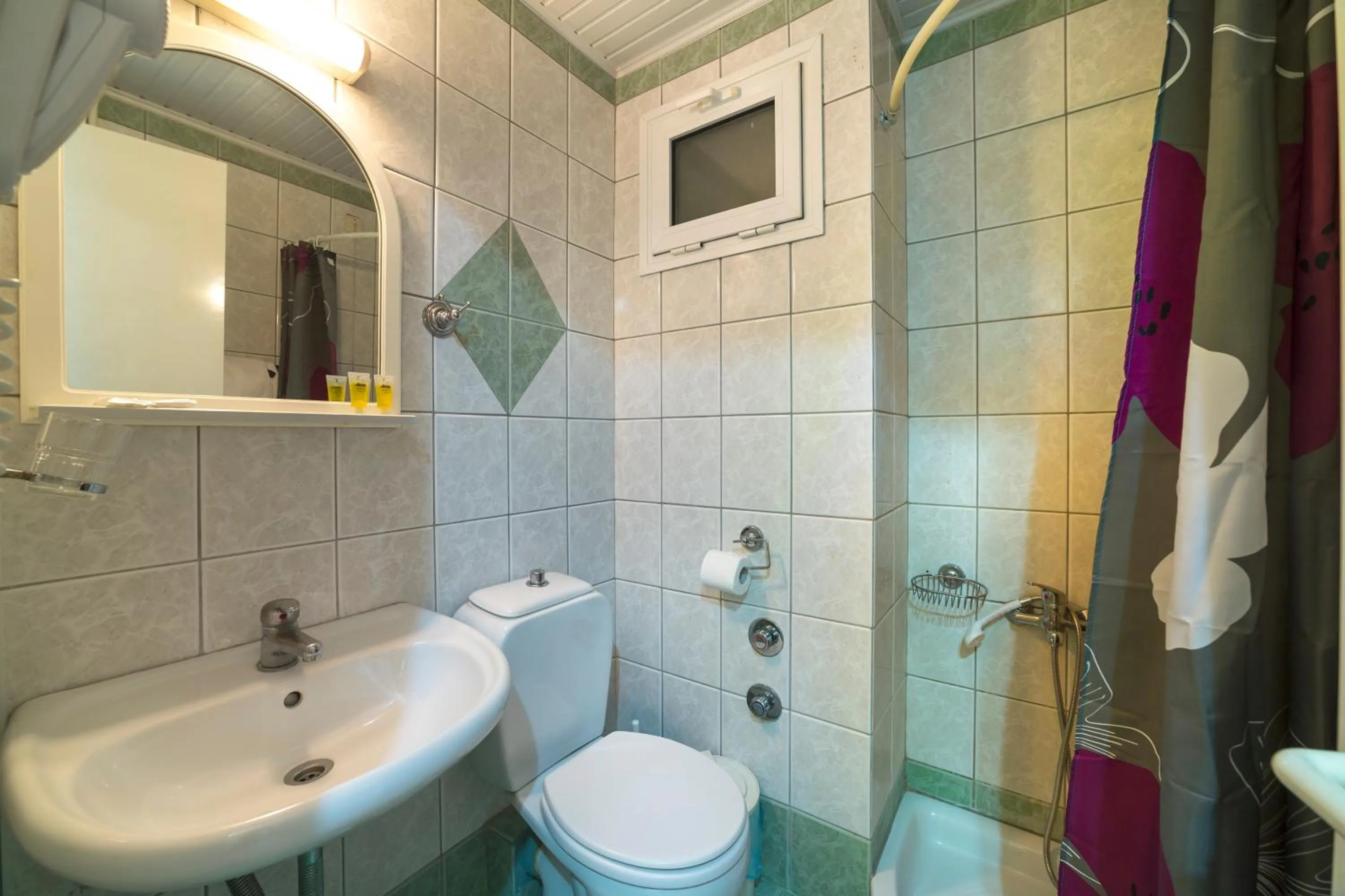 Bathroom in Delfini Hotel