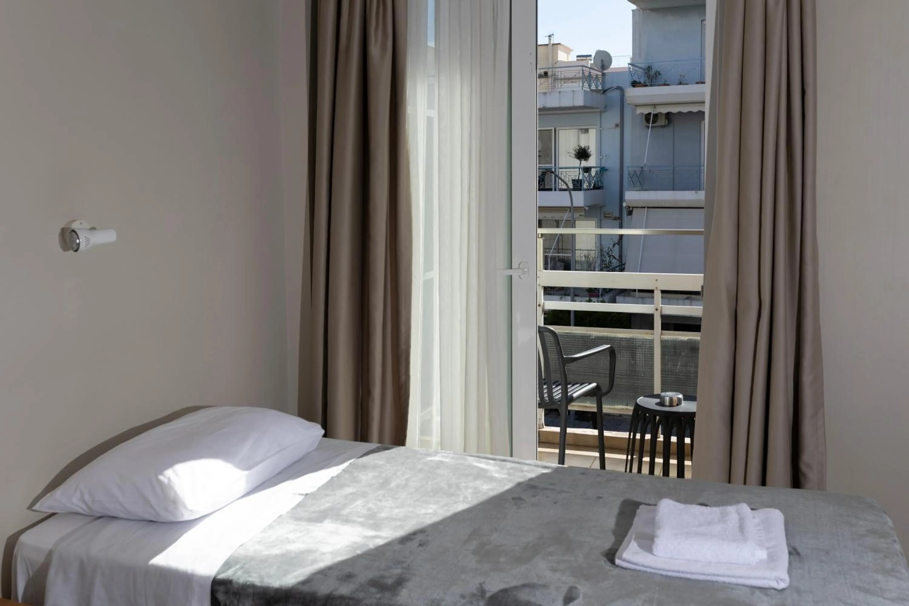 Bed in Delfini Hotel