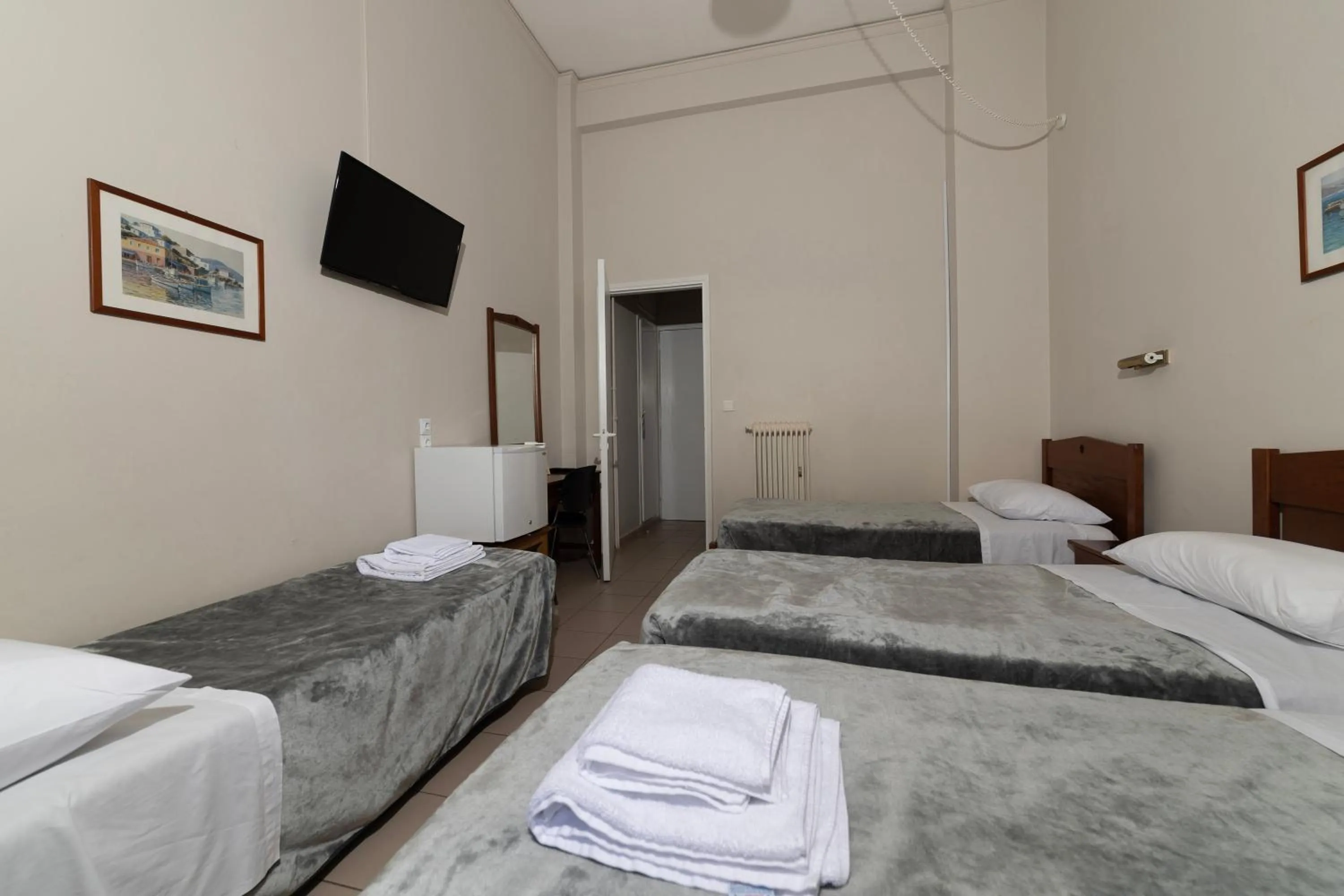 Bed in Delfini Hotel