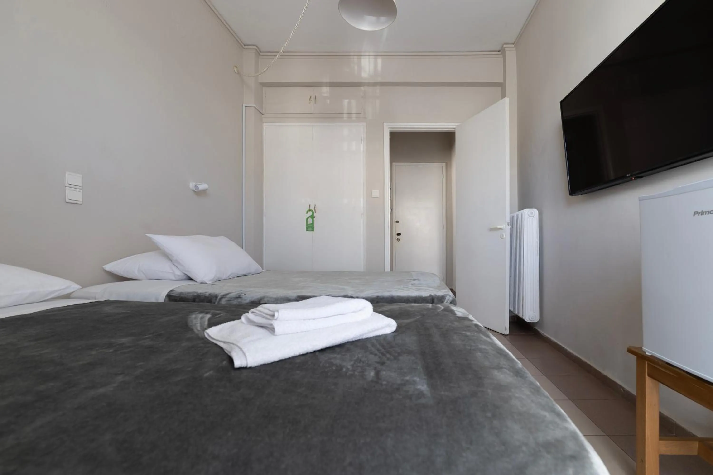 Bed in Delfini Hotel