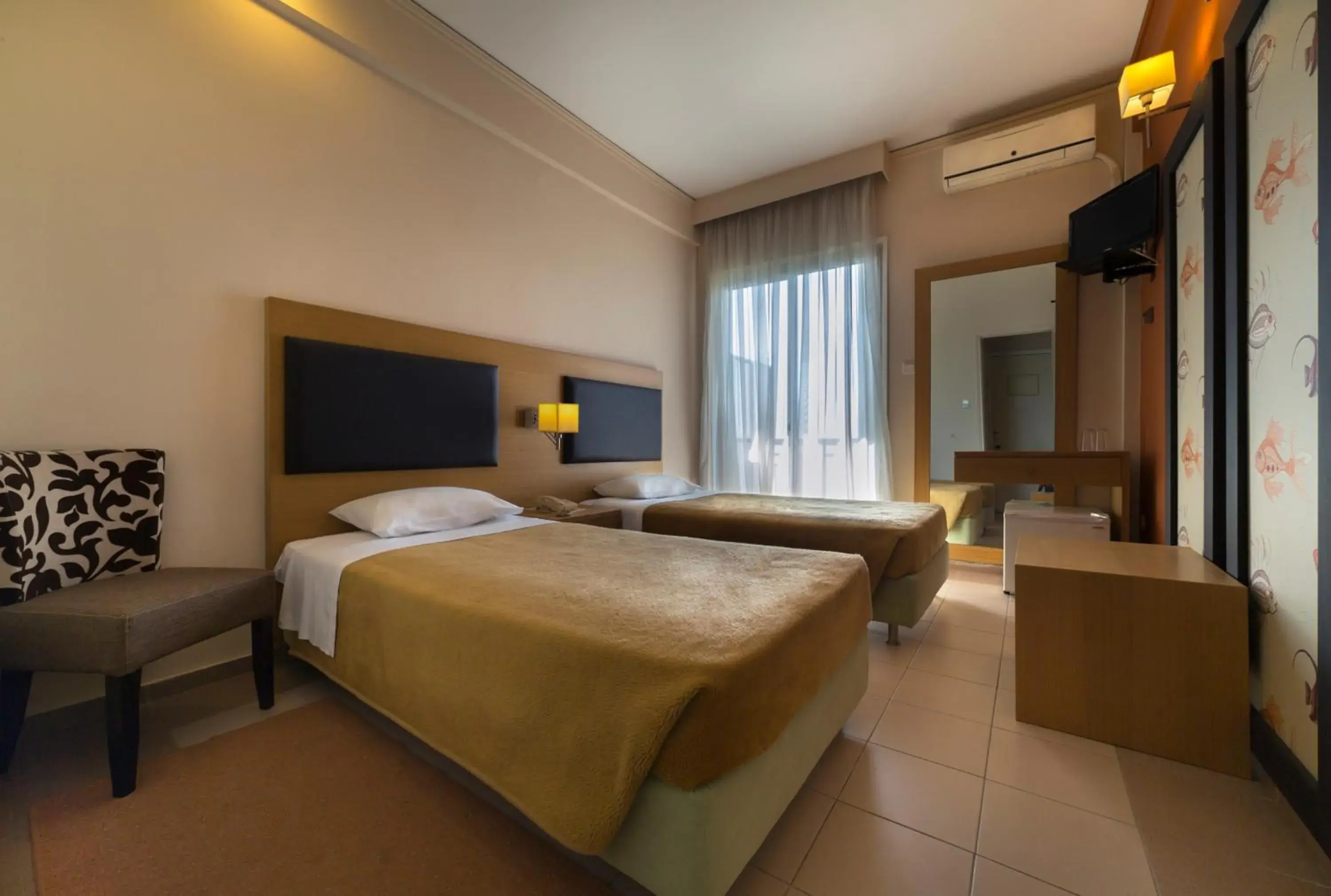 Photo of the whole room, Bed in Delfini Hotel Photo of the whole room, Bed in Delfini Hotel