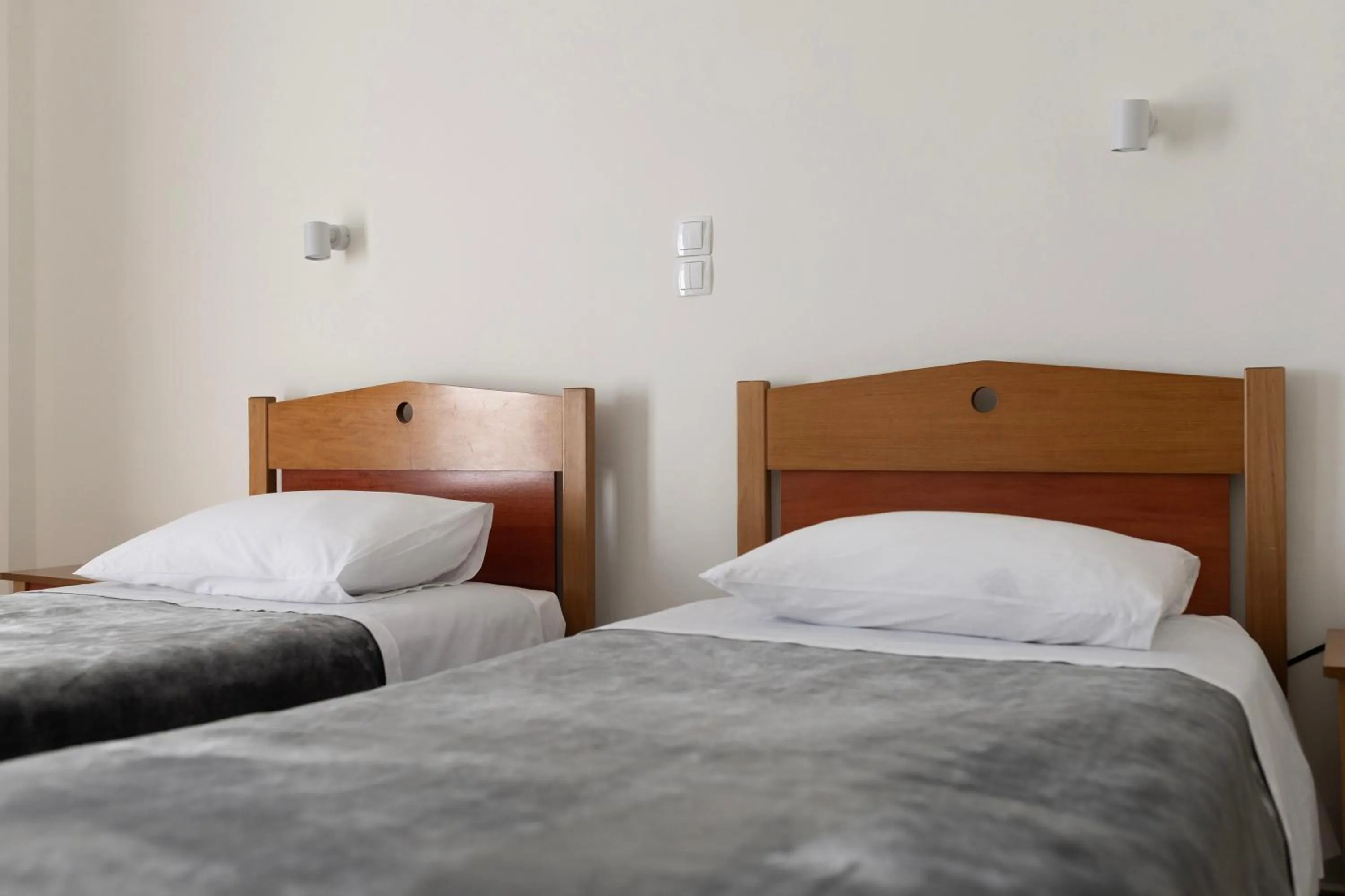 Bed in Delfini Hotel