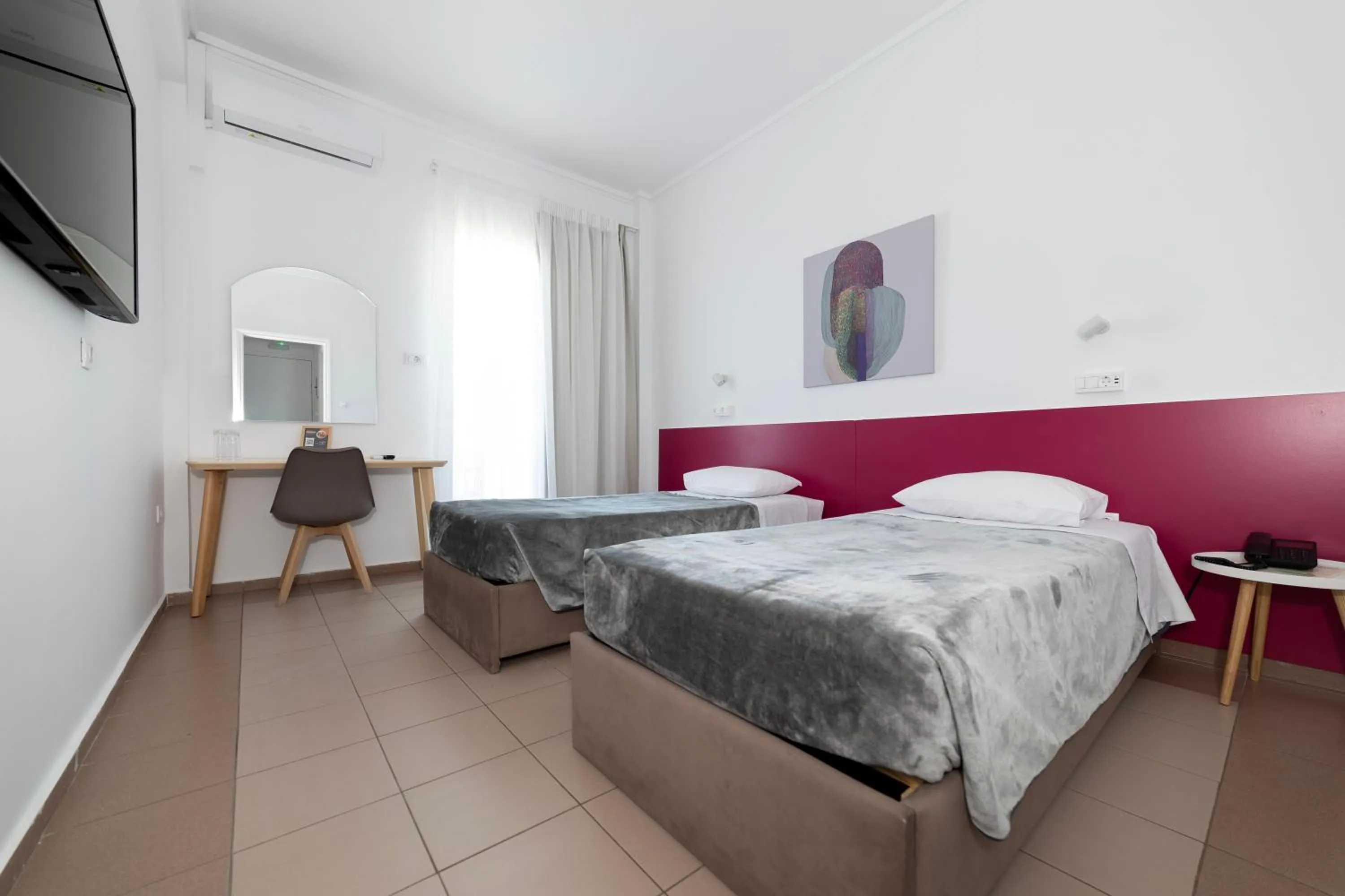 Bed in Delfini Hotel