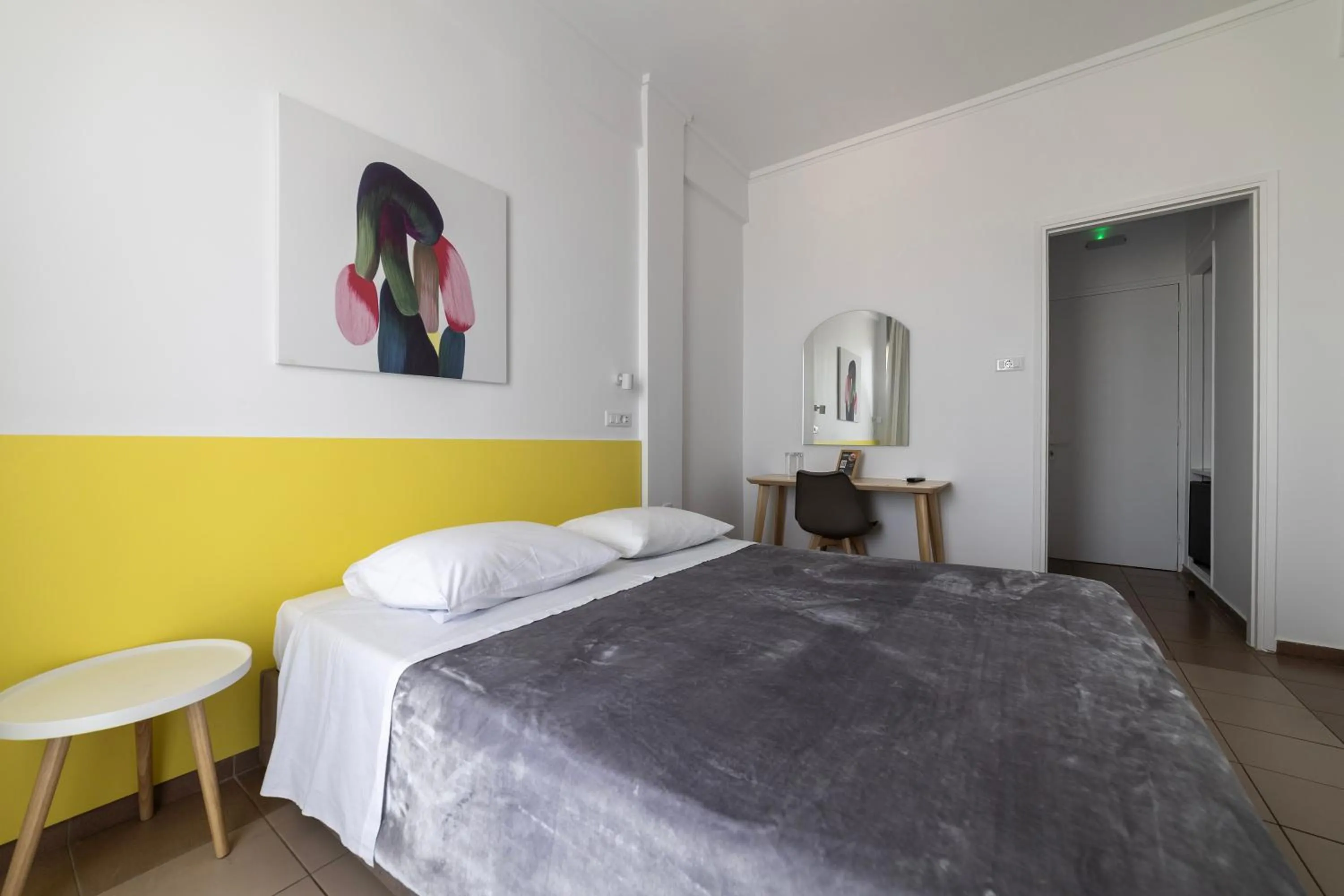 Bed in Delfini Hotel