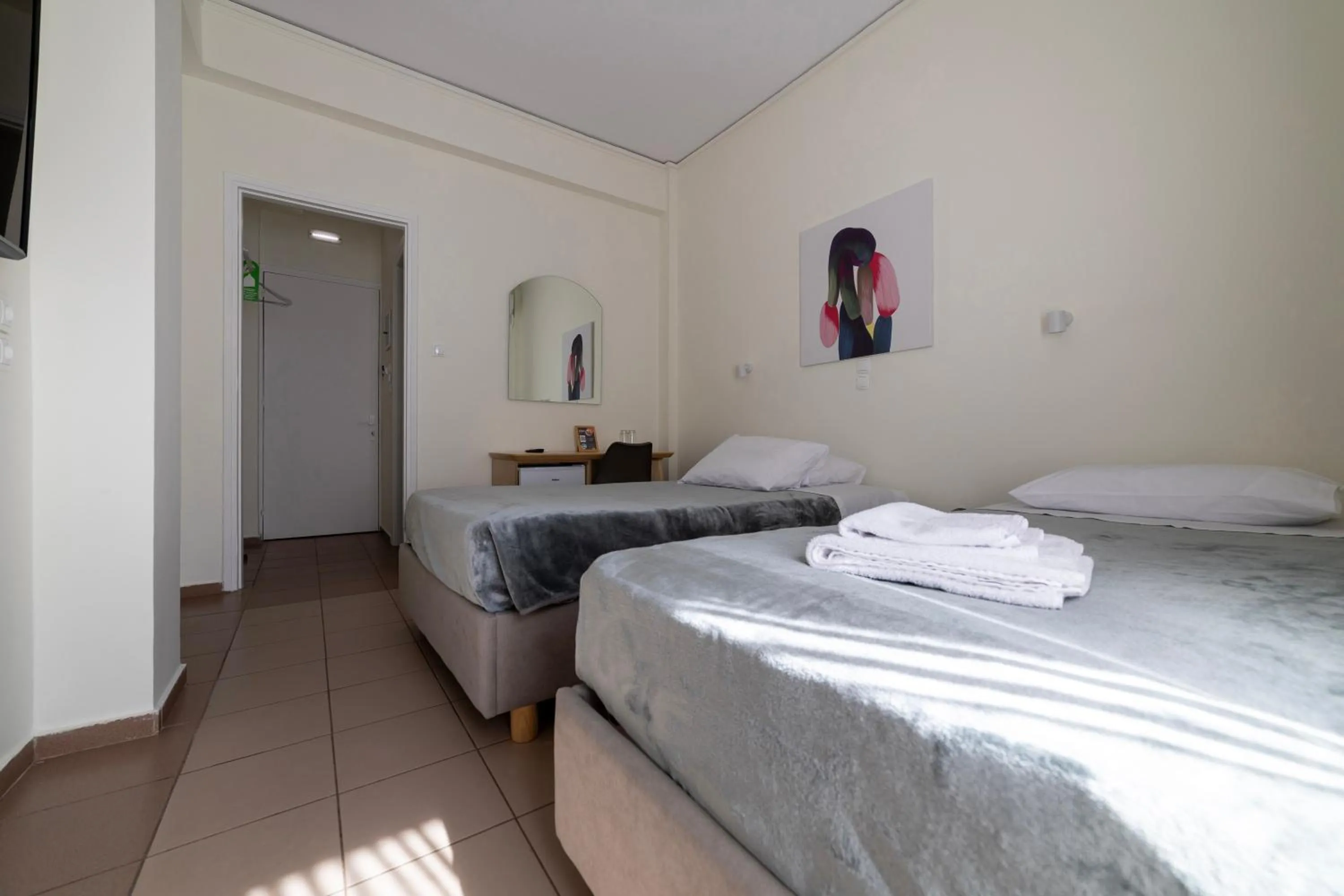 Bed in Delfini Hotel