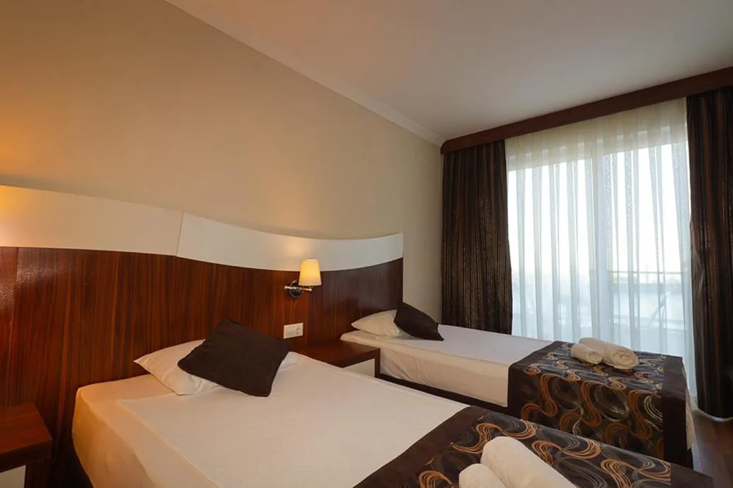 Bedroom in Throne Beach Resort &amp; Spa - Ultra All Inclusive