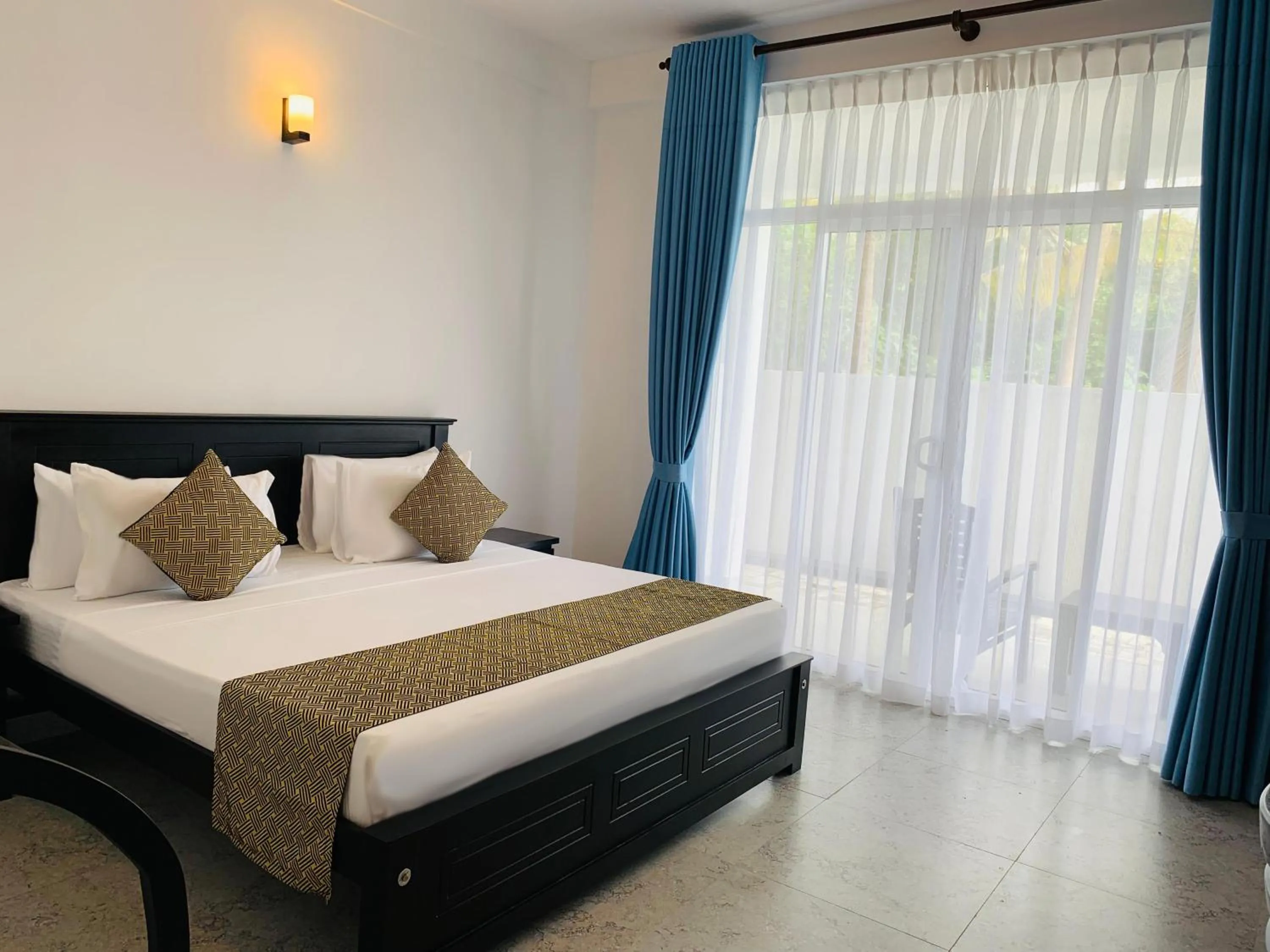 Bed in Palazzo Beach Hotel