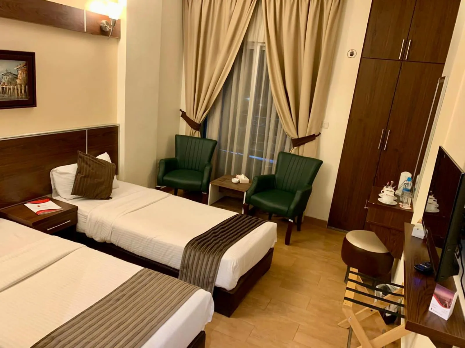 Bed in Ream Hotel Amman