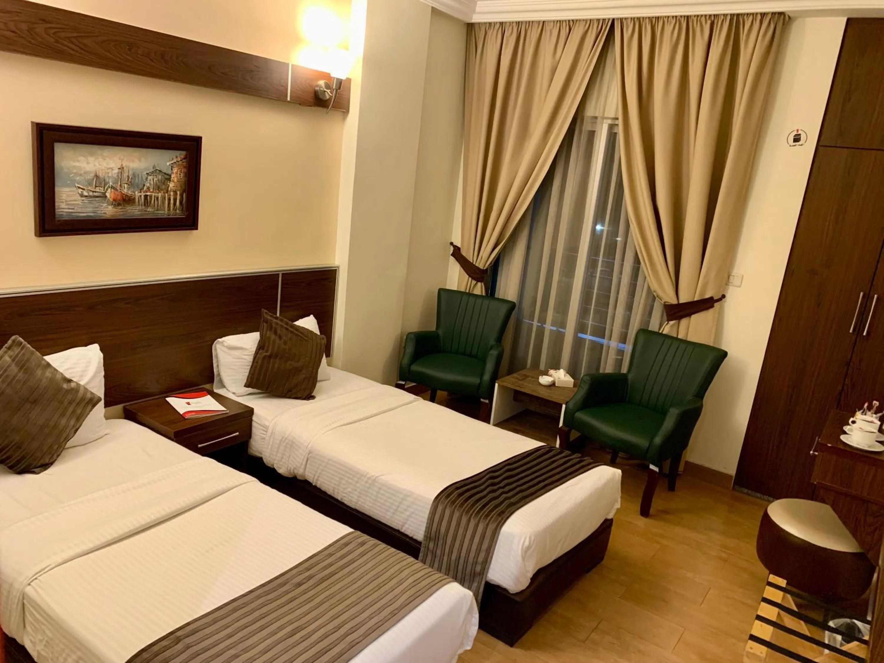 Bed in Ream Hotel Amman