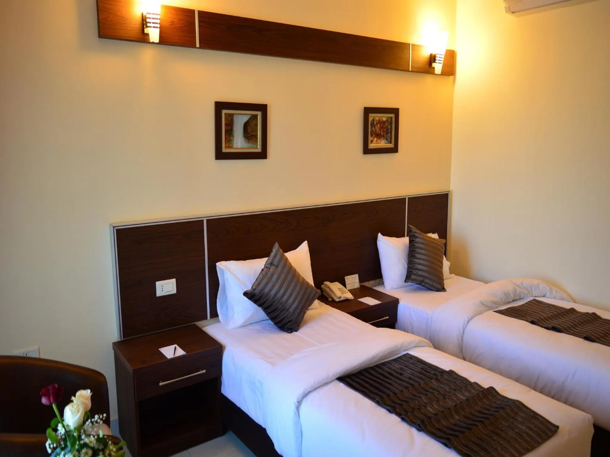 Bed in Ream Hotel Amman