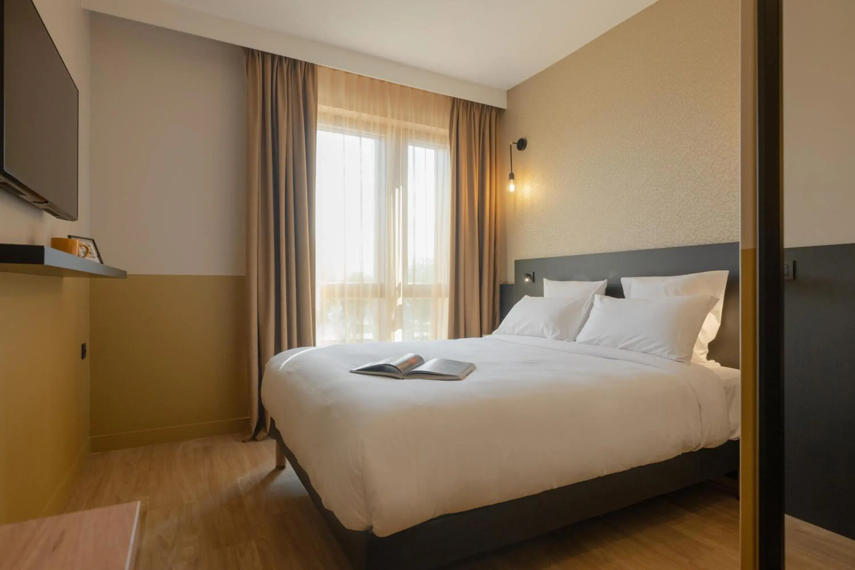 Bed in All Suites Hôtel - Paris Pleyel - L'Île Saint Denis Bed in All Suites Hôtel - Paris Pleyel - L'Île Saint Denis