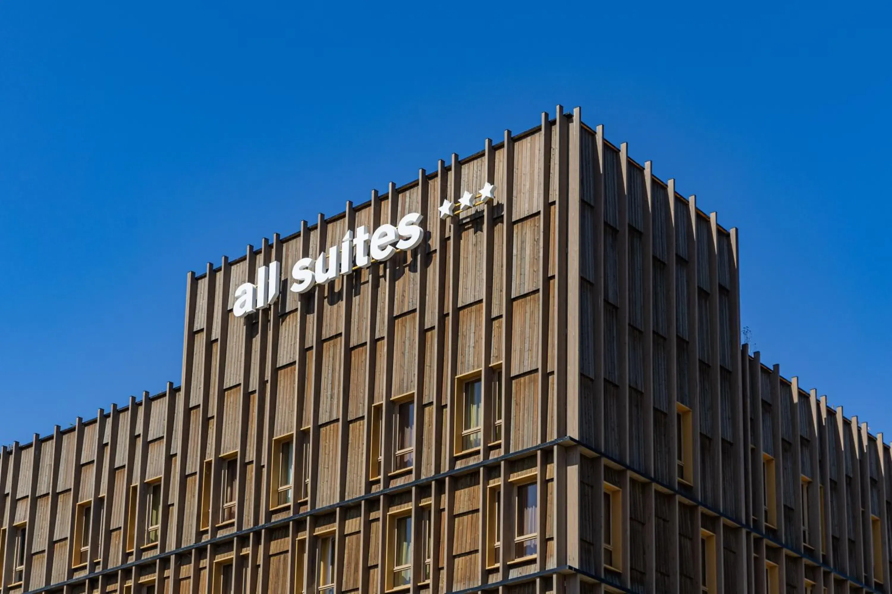 Property building in All Suites Hôtel - Paris Pleyel - L'Île Saint Denis Property building in All Suites Hôtel - Paris Pleyel - L'Île Saint Denis