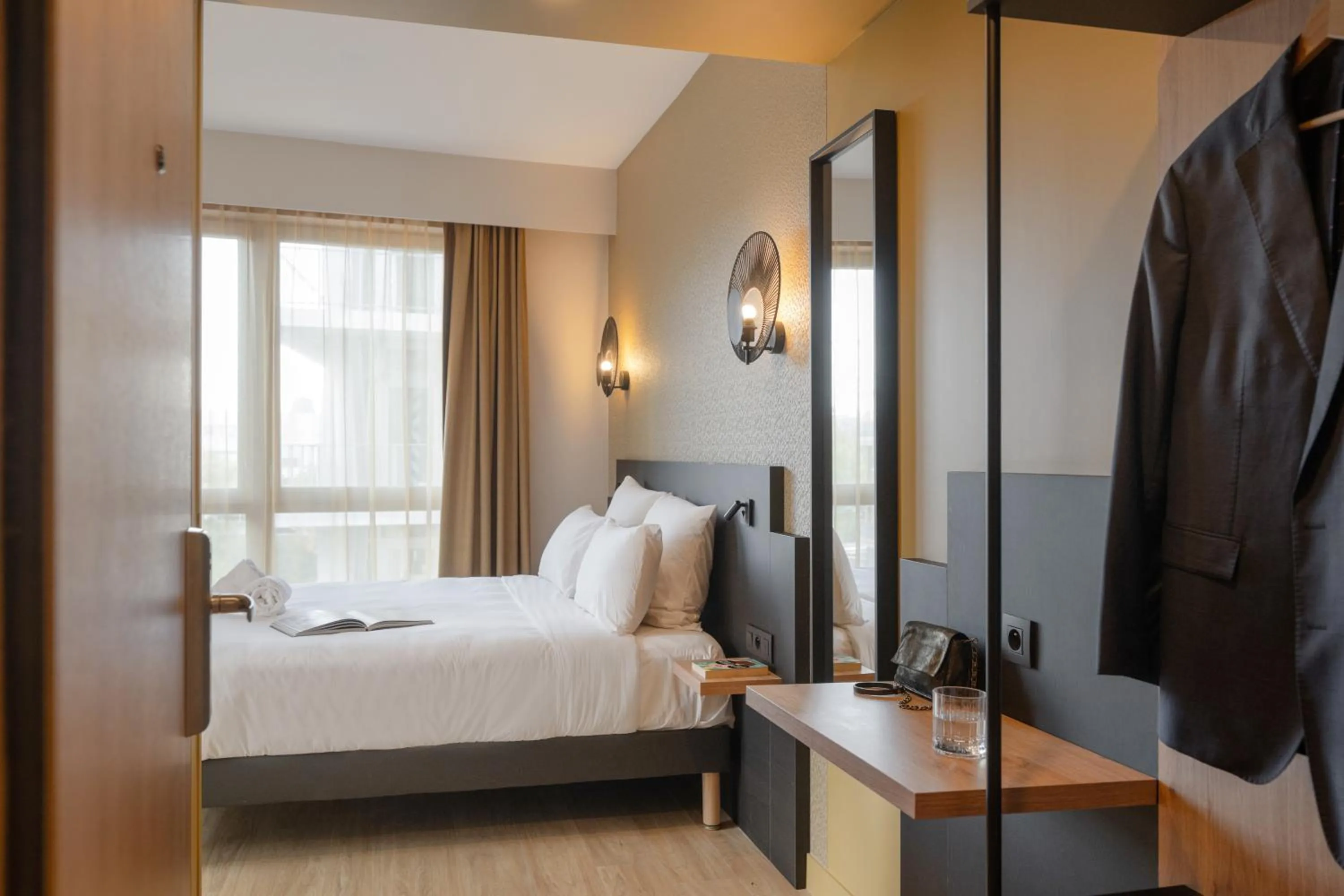 Bed in All Suites Hôtel - Paris Pleyel - L'Île Saint Denis