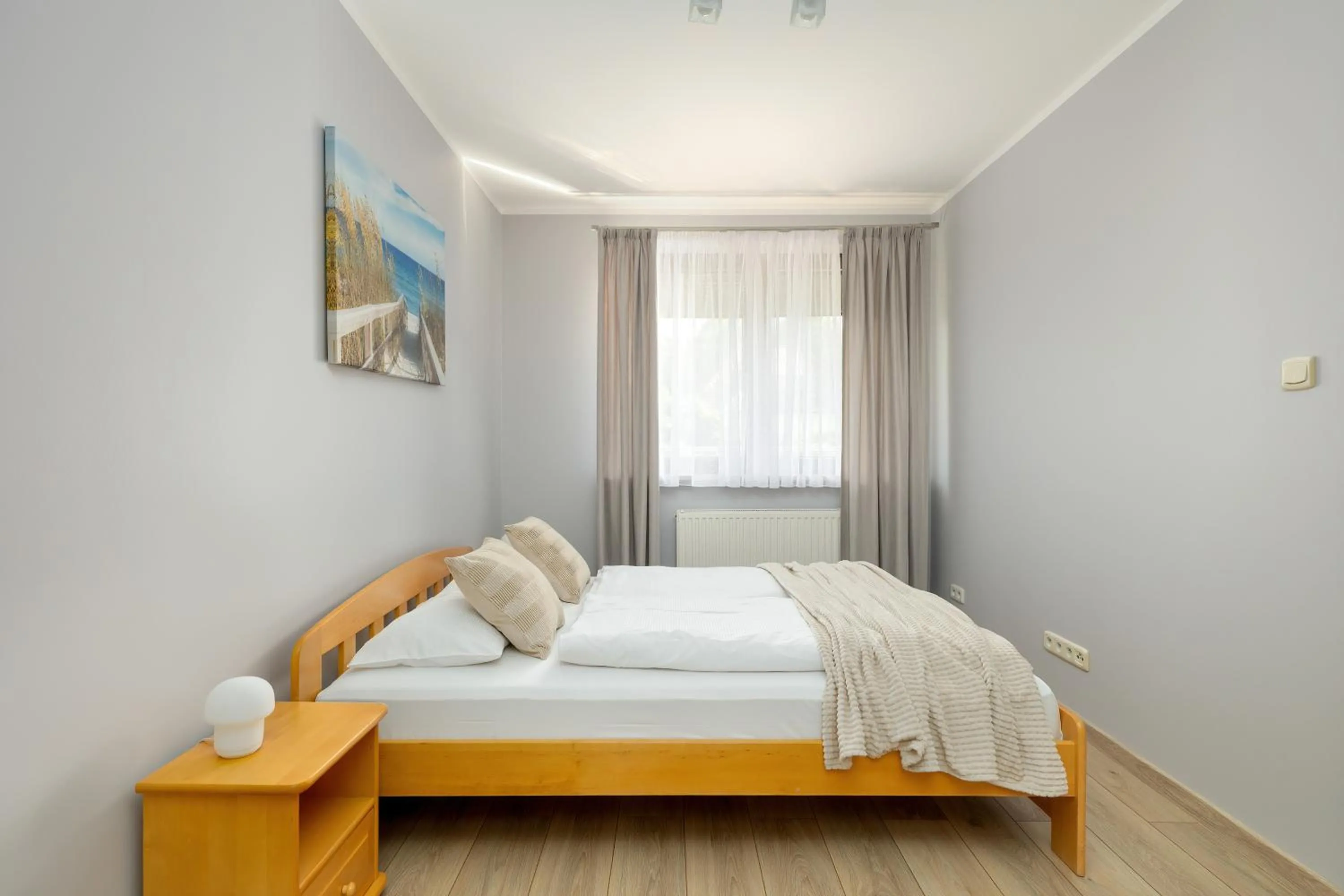 Bed in Apartamenty Żeromskiego 29 by Noclegi Renters