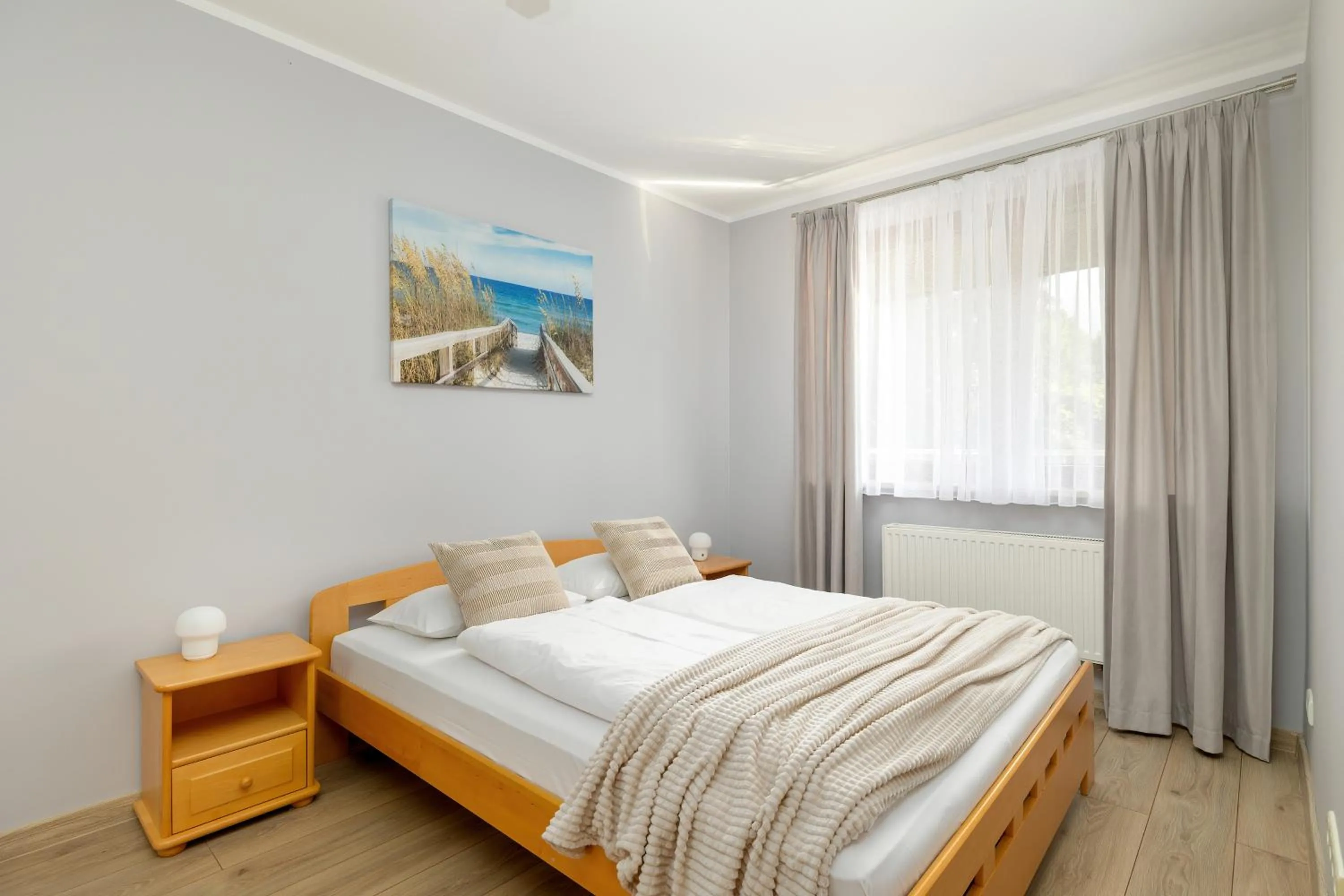 Bed in Apartamenty Żeromskiego 29 by Noclegi Renters