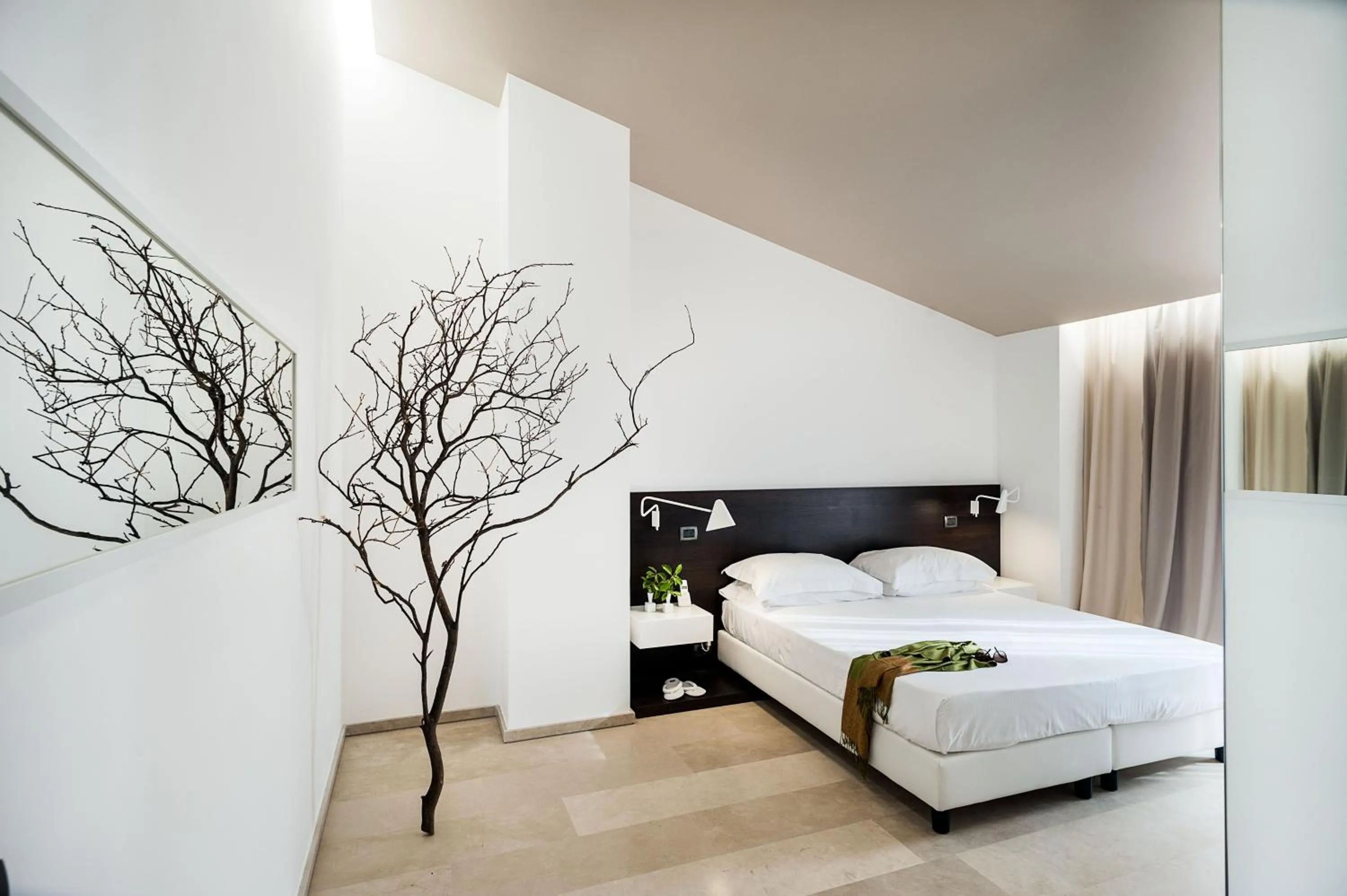 Decorative detail, Bed in Ramo d'Aria Etna Boutique Hotel