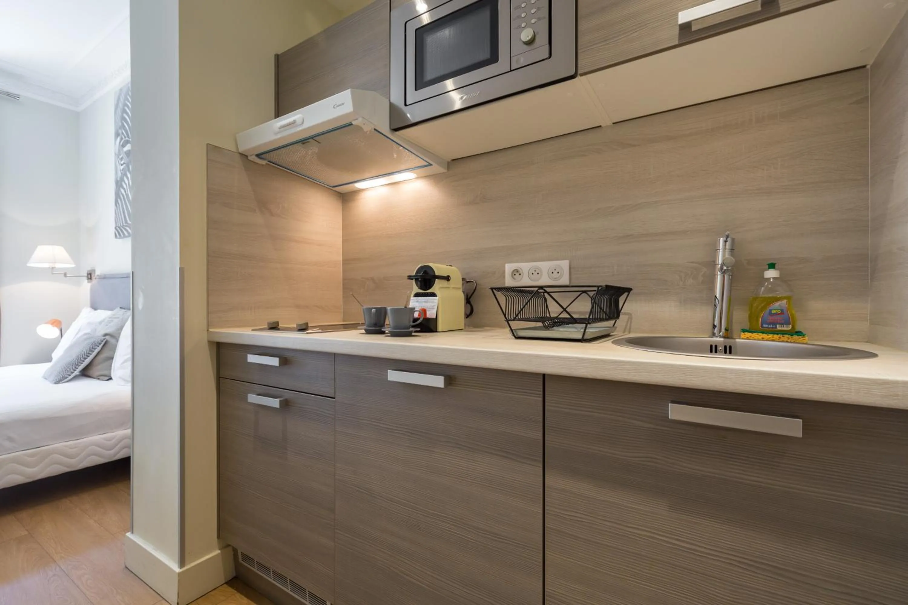 Kitchen or kitchenette, Bed in Florella Jean Jaures Apartment